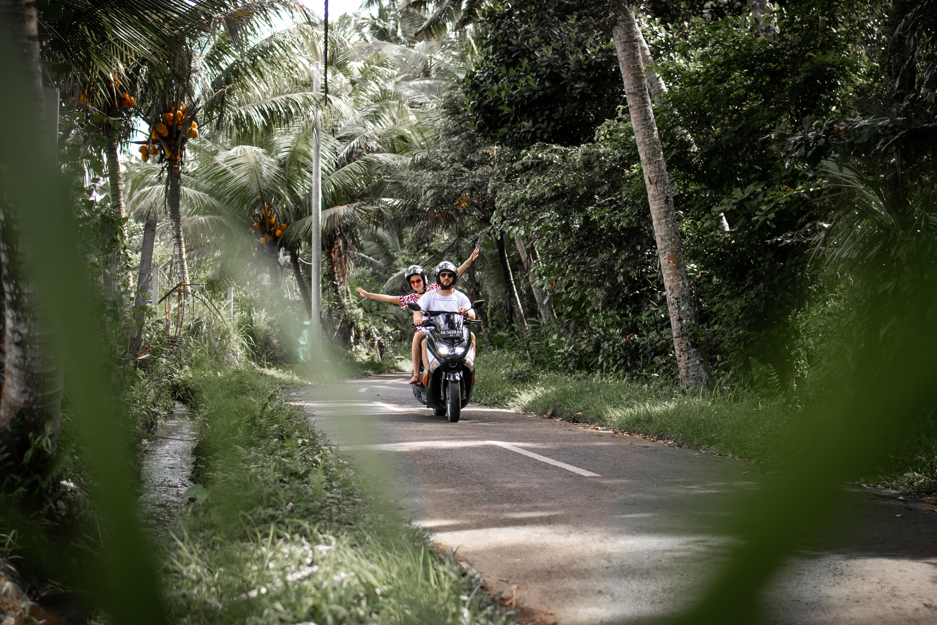 Riding scooters is a popular tourist activity in Bali. Photo / File