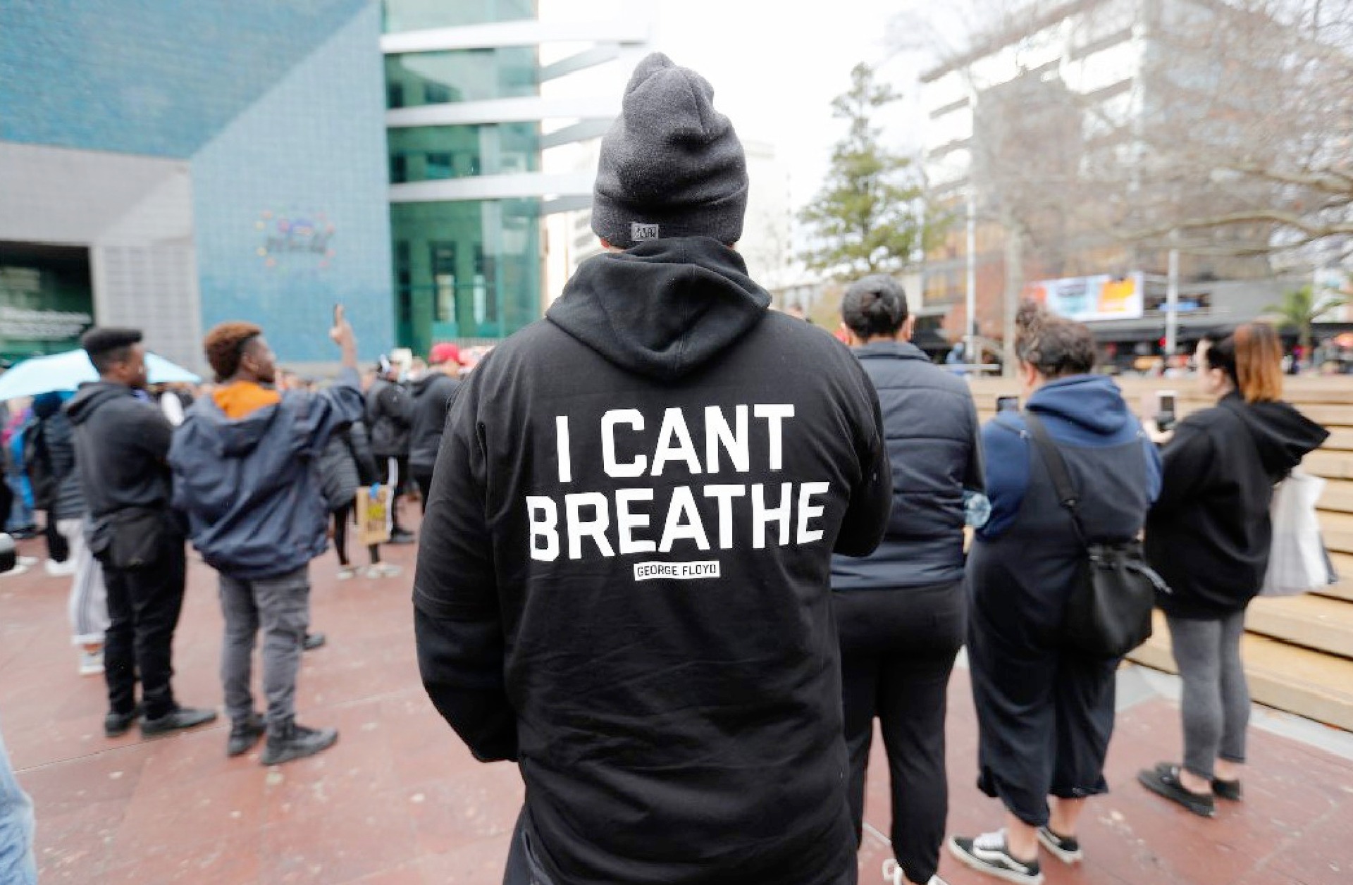 A protester at the Black Lives Matter march in Auckland wears a shirt with George Floyd's last words. Photo / Dean Purcell