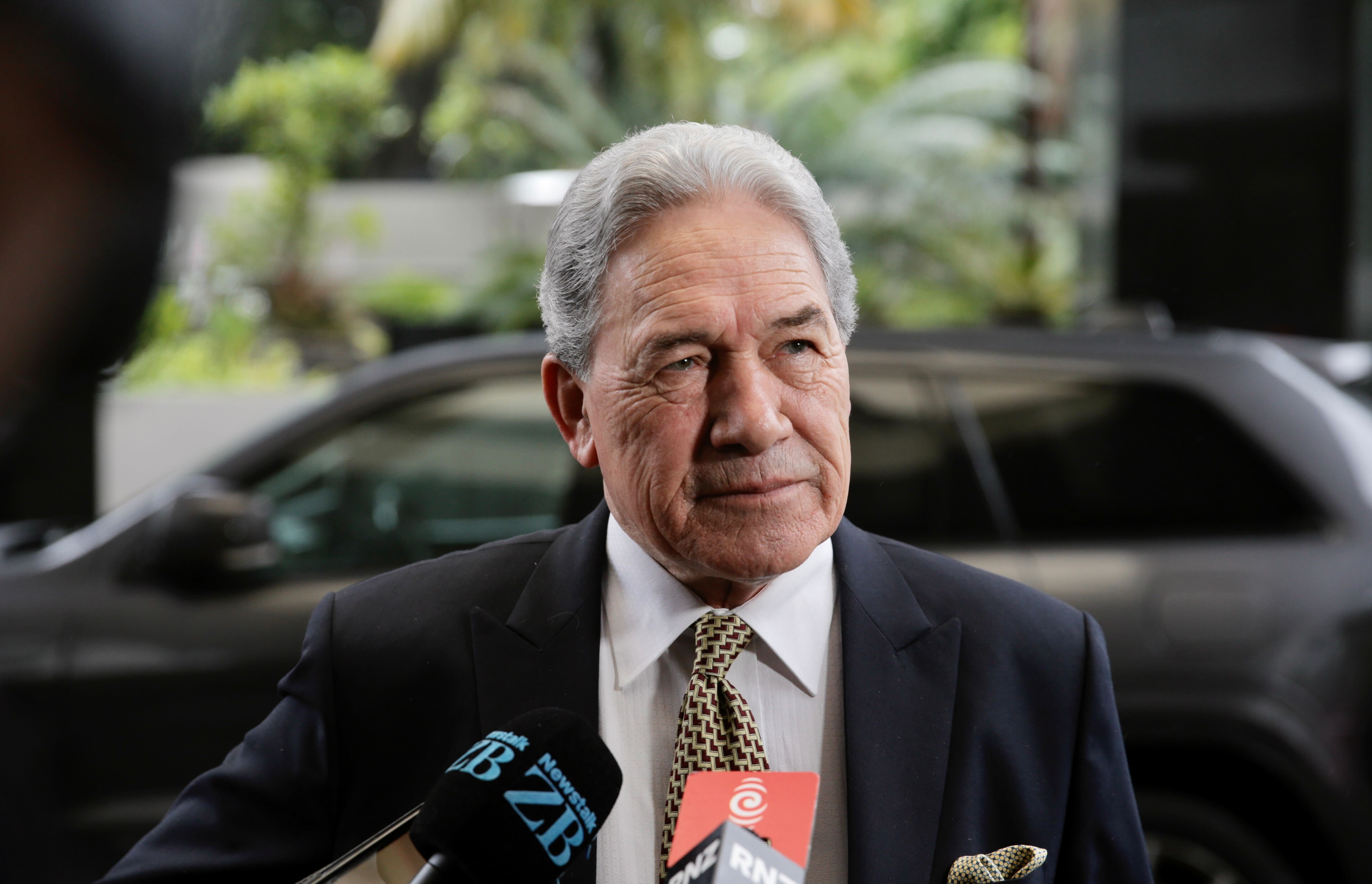 Winston Peters talks to media at Cordis Hotel in Auckland as coalition negotiations continue. Photo / Alex Burton