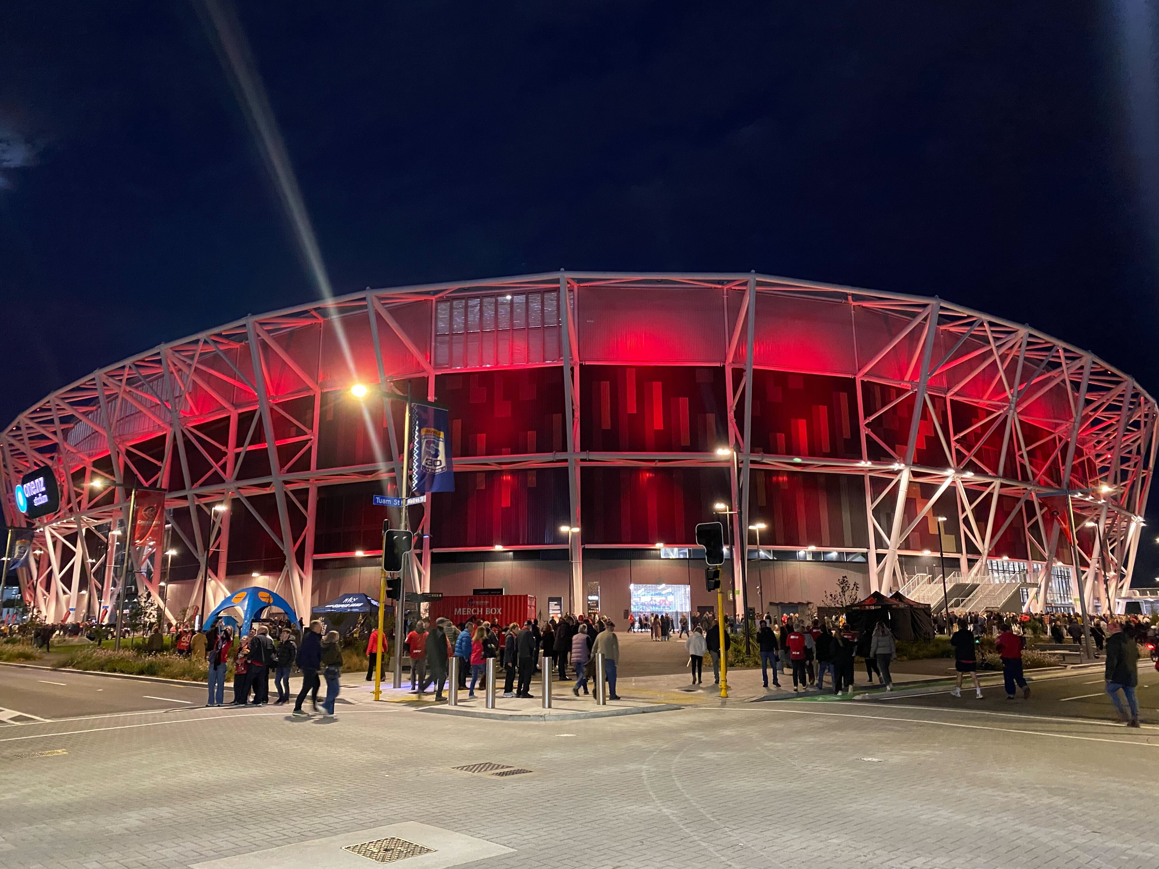 One NZ Stadium shone red to mark its first event. Photo / Jazlyn Whales