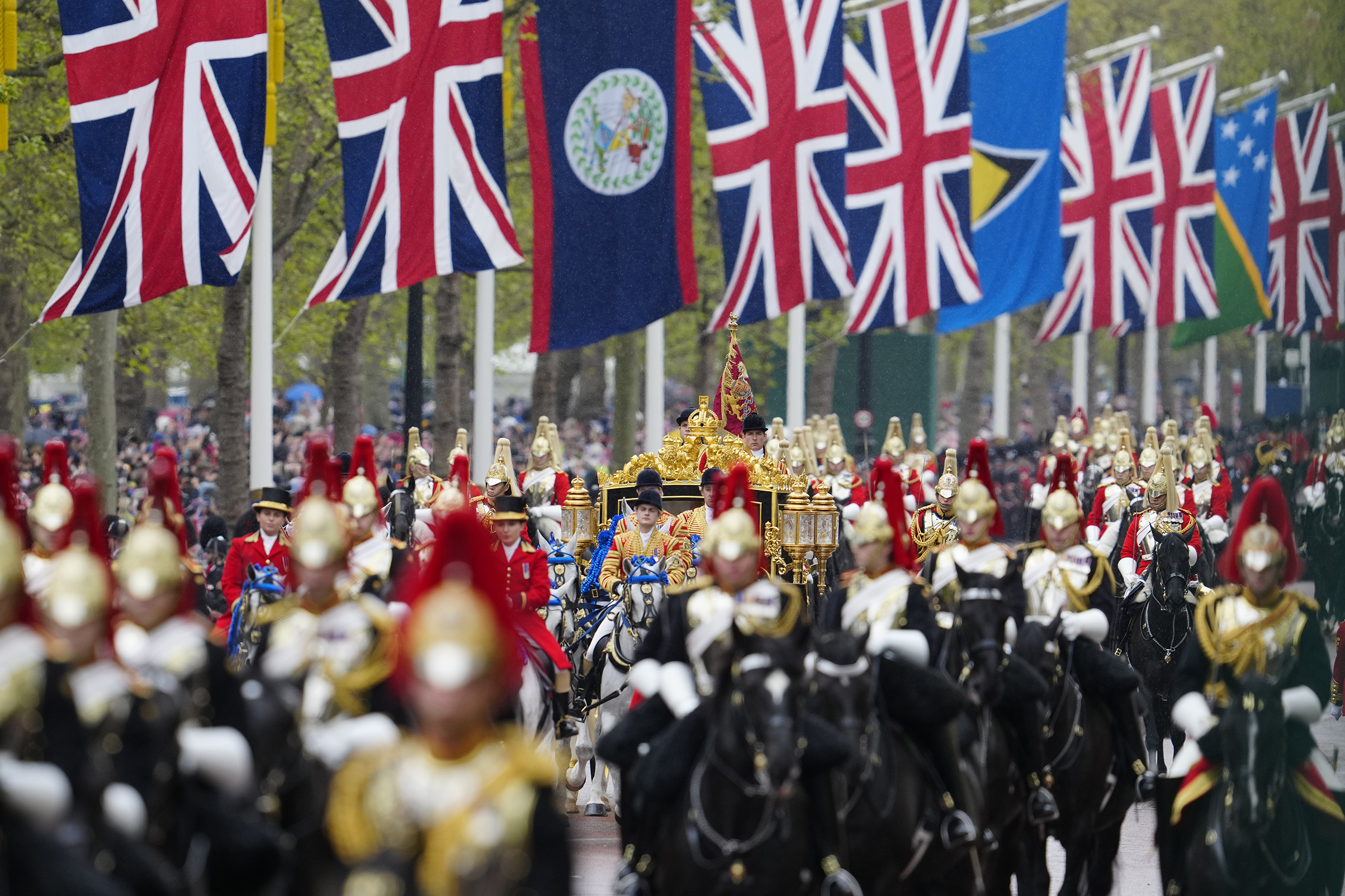King Charles III and Camilla, the Queen Consort, on the way to the coronation ceremony at Westminster Abbey. Photo / AP
