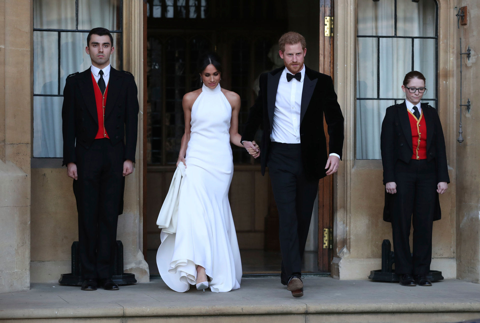 Duke and Duchess of Sussex, Meghan Markle and Prince Harry, leave Windsor Castle after their wedding in Windsor. Photo / AP