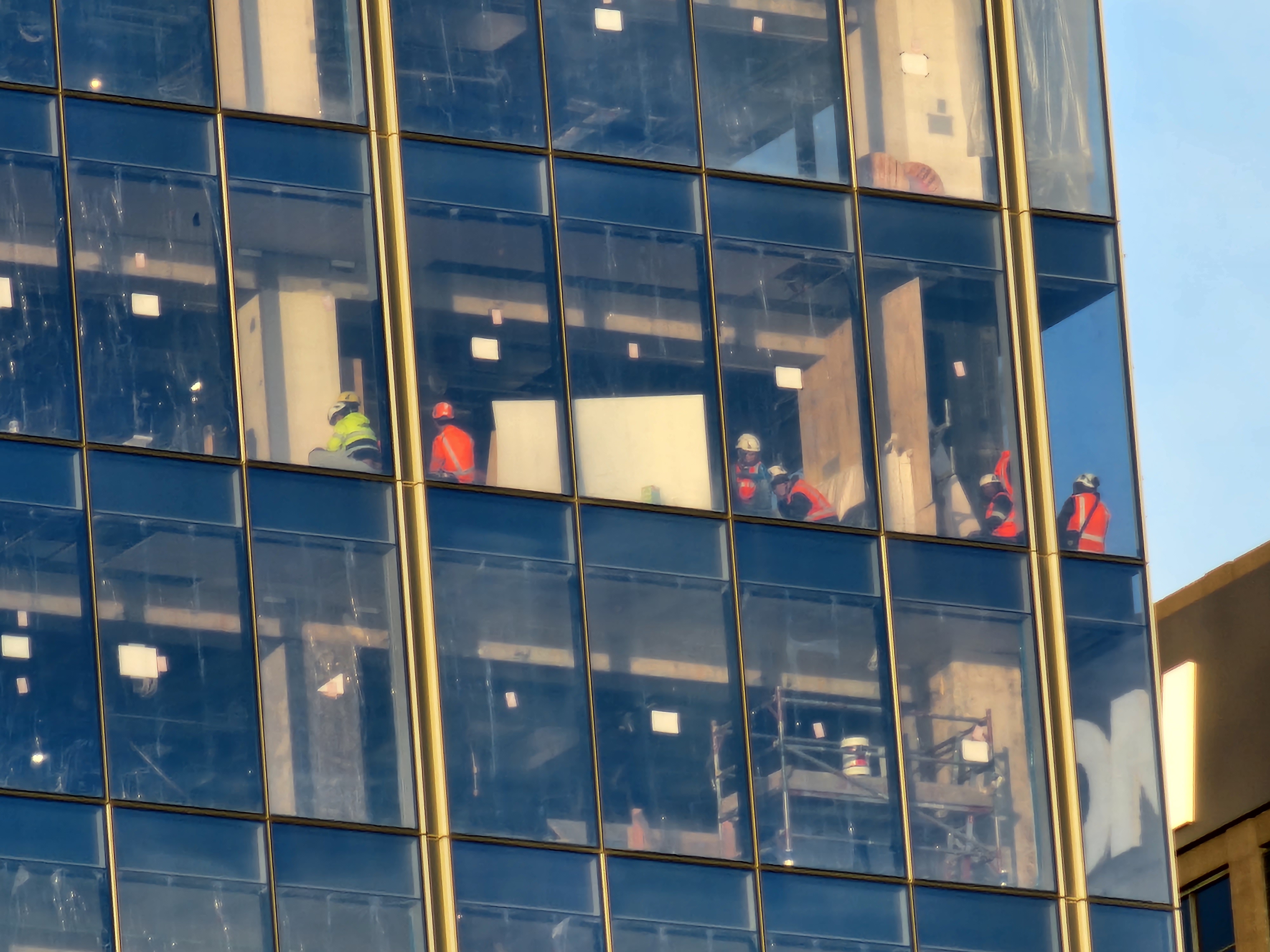Police respond to an ongoing incident at the Deloitte building in Auckland's CBD. Photo / Supplied