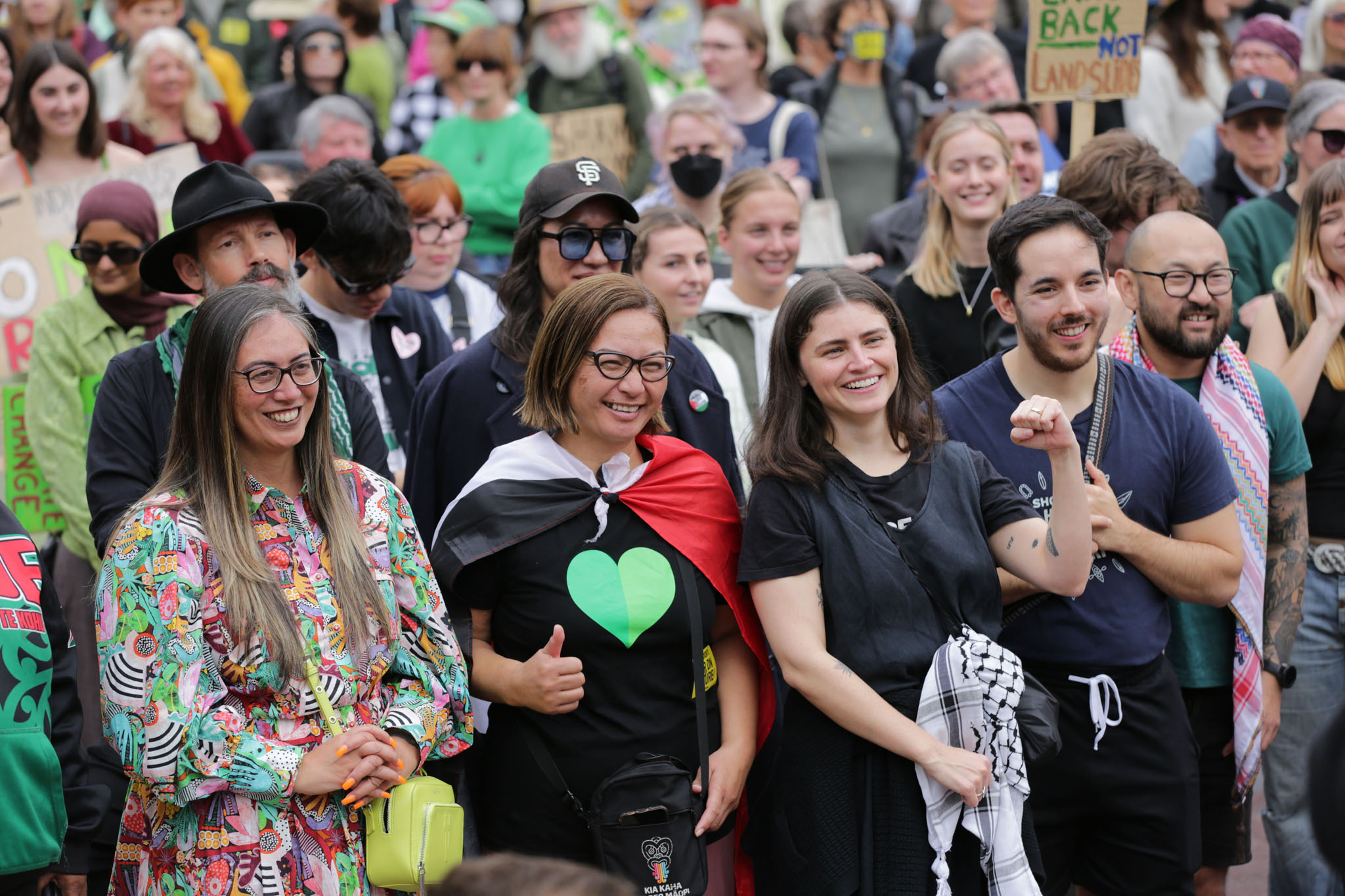 Green Party co-leaders Marama Davidson (centre, one from left) and Chlöe Swarbrick (on her right) attend the protest, alongside Green MPs Huhana Lyndon, Ricardo Menendez March and Lawrence Xu-Nan. Photo / Sylvie Whinray