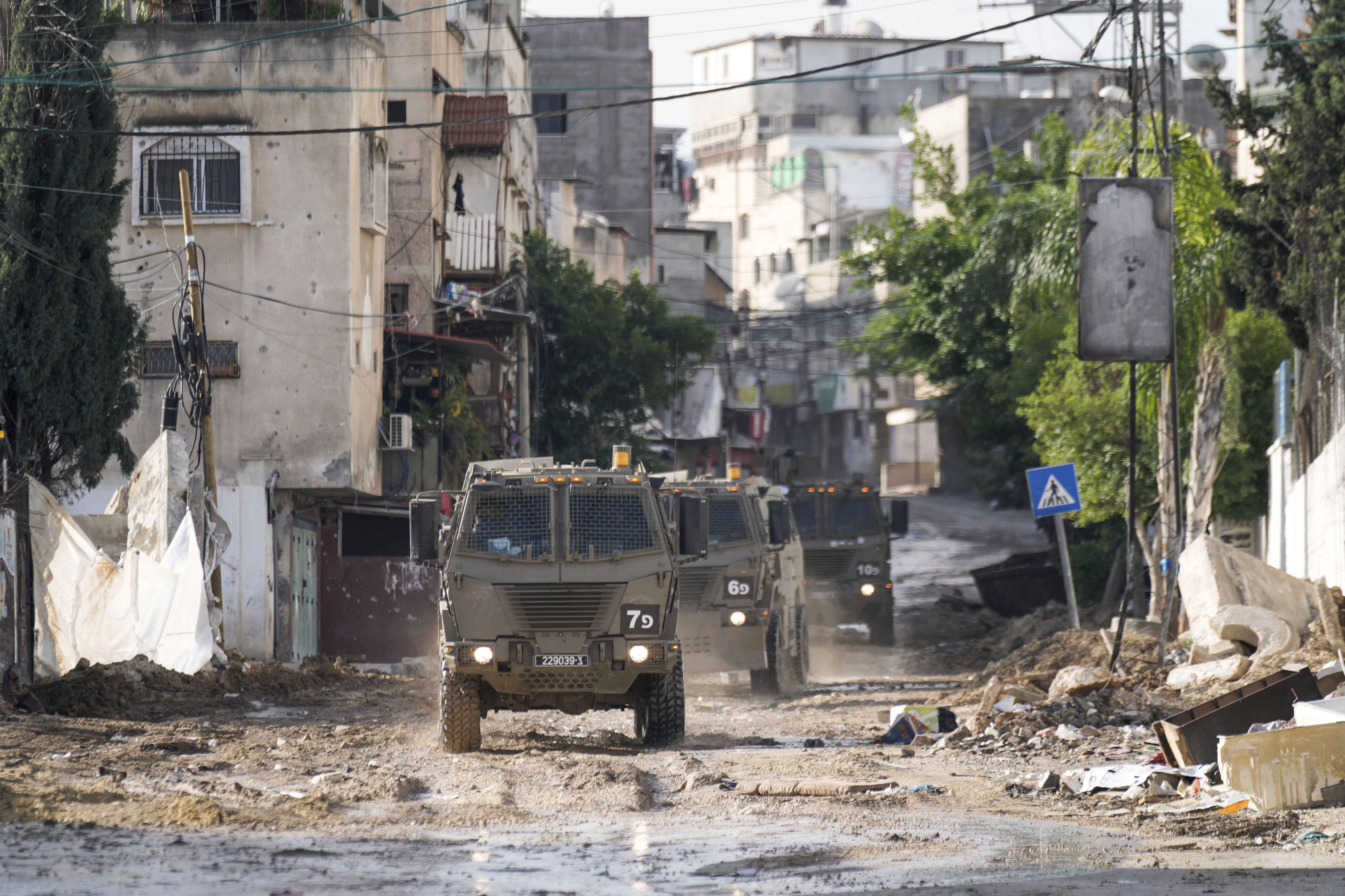 Israeli military vehicles are seen in the town of Tulkarem, West Bank. Photo / AP