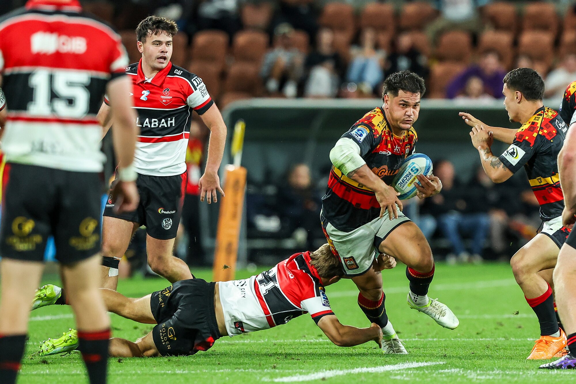 Chiefs midfielder Quinn Tupaea makes a break against the Crusaders. Photo / Photosport