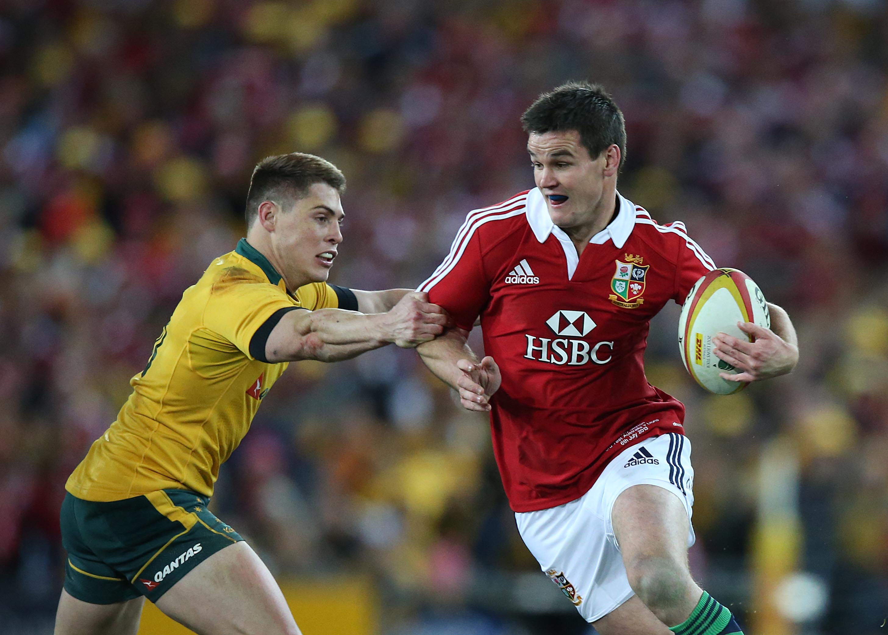 British and Irish Lions' playmaker Jonathan Sexton is tackled by Wallabies first five James O'Connor. Photo / INPHO / Billy Stickland