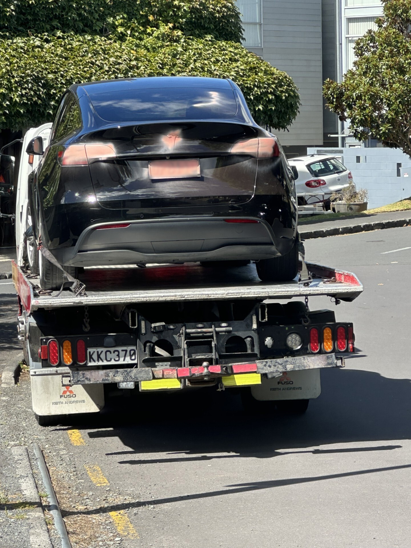 One man's Tesla had to be towed after the spray paint rendered it undriveable.