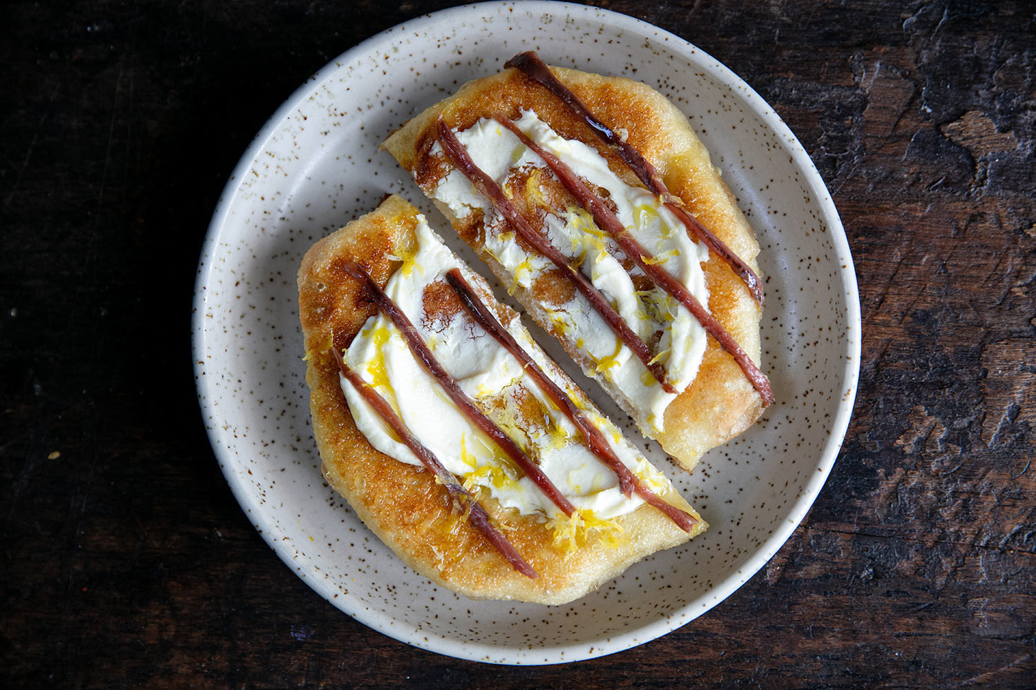 The ricotta and anchovy fried pizza. Photo / Babiche Martens