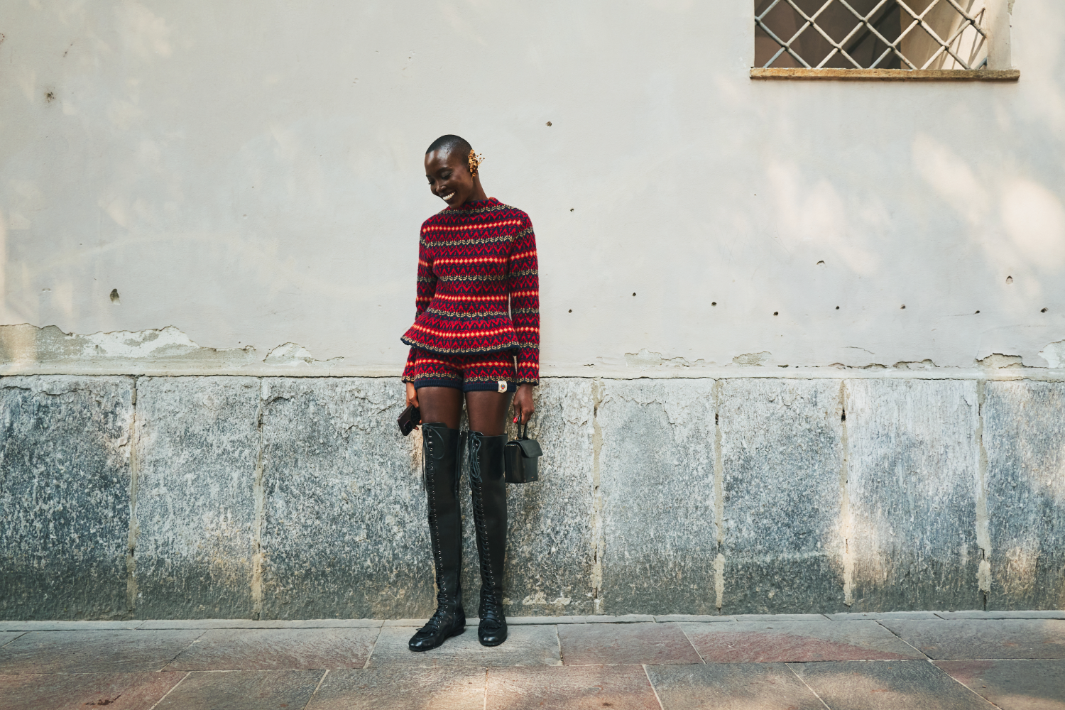 An exquisite example of how to dress for the start of “sweater weather”. Photo / Simbarashe Cha for The New York Times