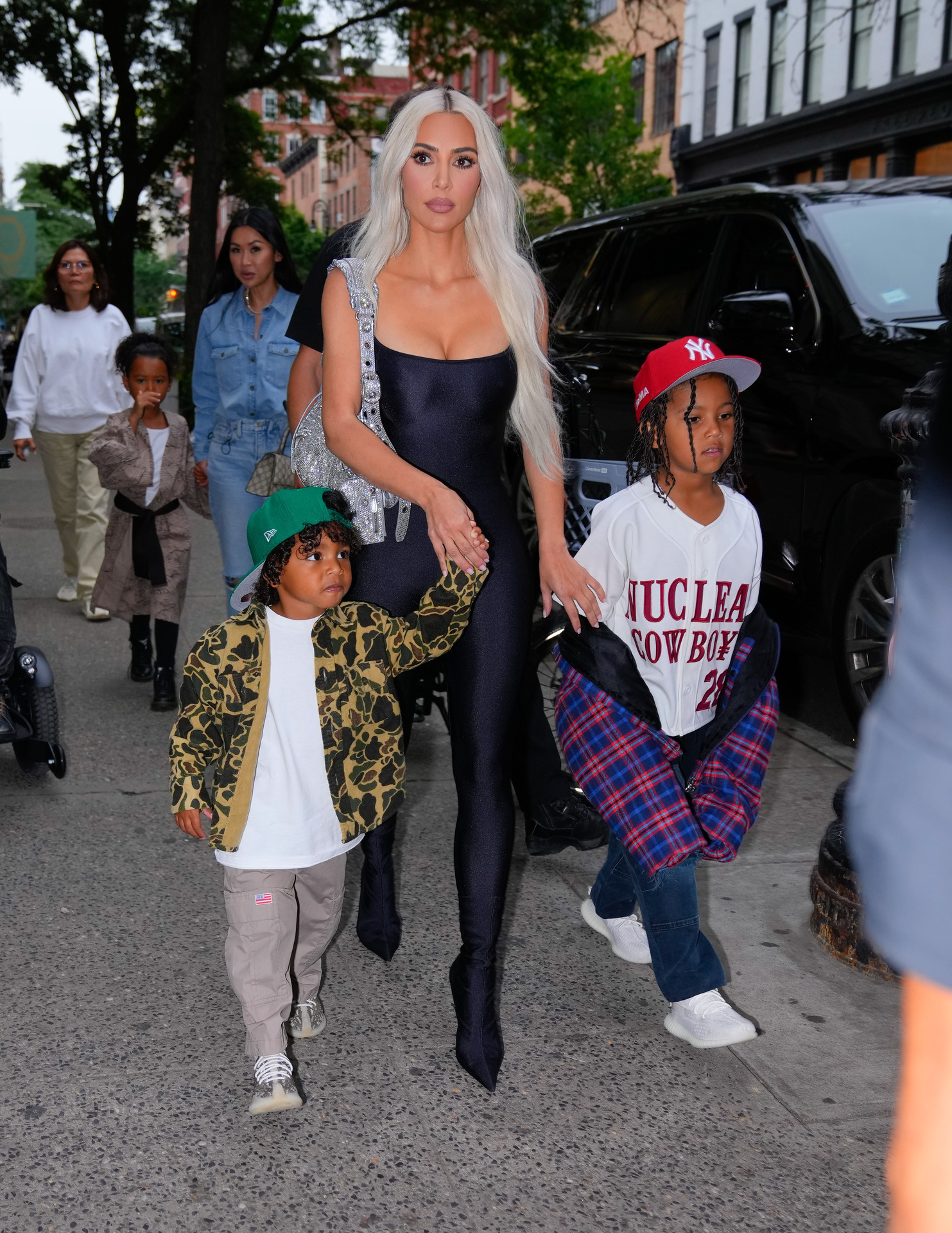 (L-R) Psalm West, Kim Kardashian and Saint West took a quick trip to New York. Photo / Getty Images