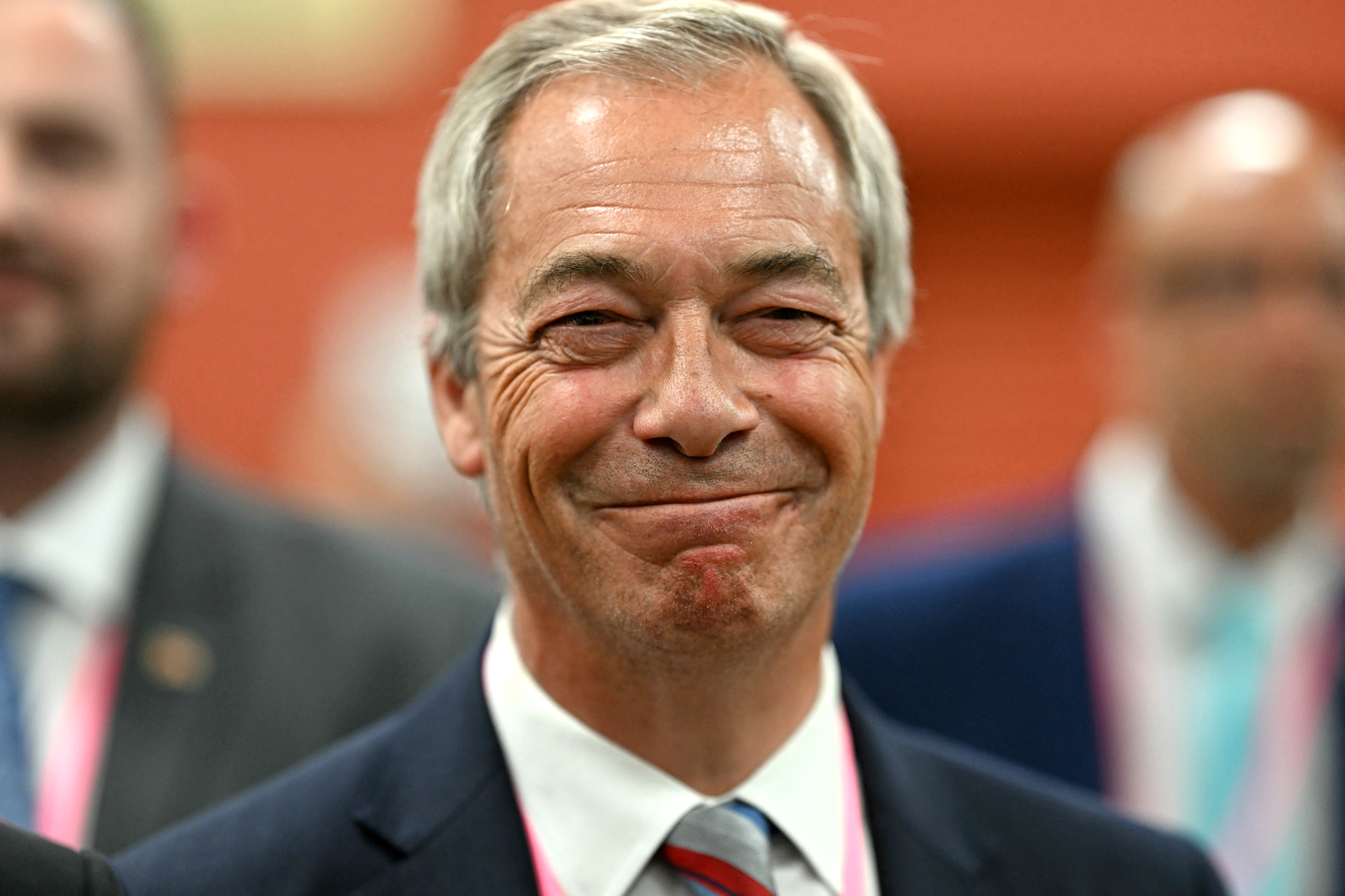Nigel Farage, leader of the Reform UK party, looks on as ballots are counted in the Runcorn and Helsby byelection at the DCBL Stadium in Widnes, northwest England. Photo / AFP