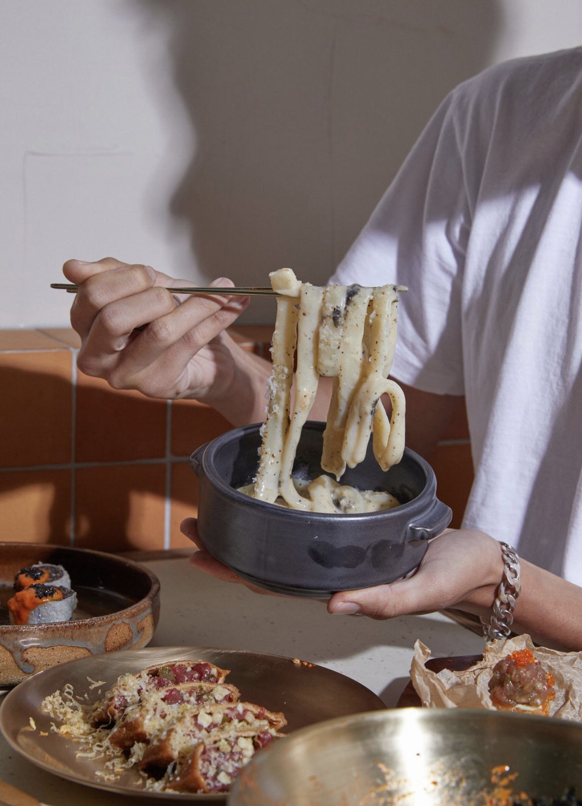 The cacio e pepe tteokbokki, among other dishes, at Aigo. Photo / @Aigo_akl