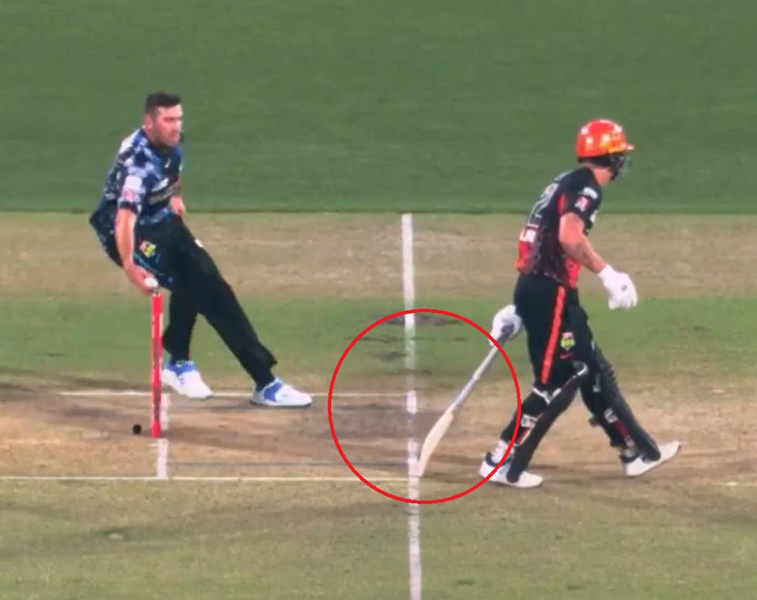 Jamie Overton knocks the bails off before giving Finn Allen a warning during a Big Bash match. Photo / X.com