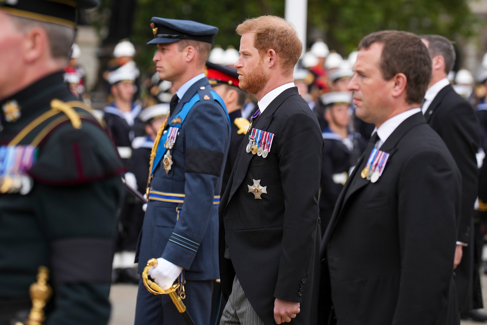 Prince William and Prince Harry follow a gun carriage carrying the coffin of Queen Elizabeth II during her funeral procession in central London. Photo / AP