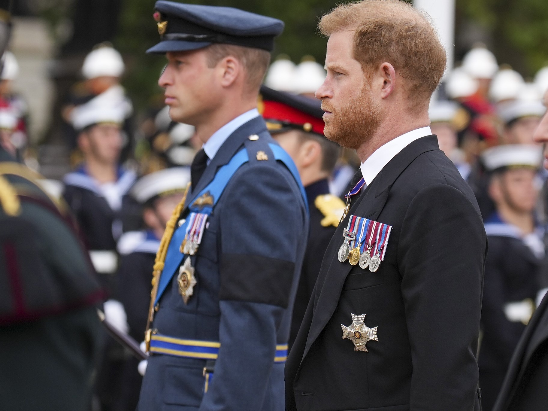 Prince William and Prince Harry follow a gun carriage carrying the coffin of Queen Elizabeth II during her funeral procession in central London. Photo / AP