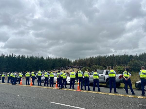 Police already work with gangs to manage gang convoys. Here police staff line SH1 during the tangi of Head Hunter William “Bird” Hines in Foxton. Photo / NZ Police