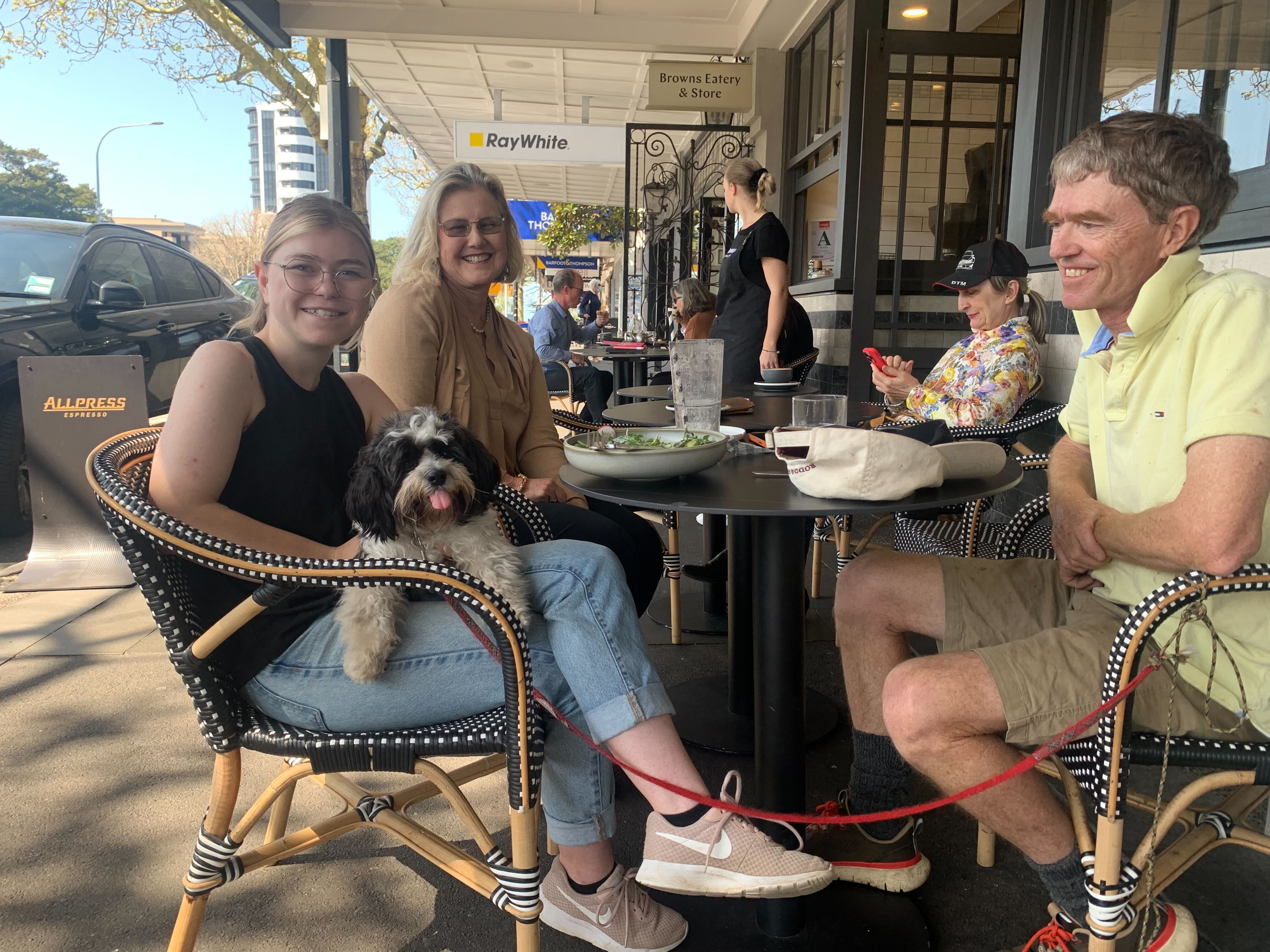 The McKenzie family with 1-year-old miniature Maltese, Daisy, at Browns Eatery in Remuera, Auckland. Photo / Adam Pearse