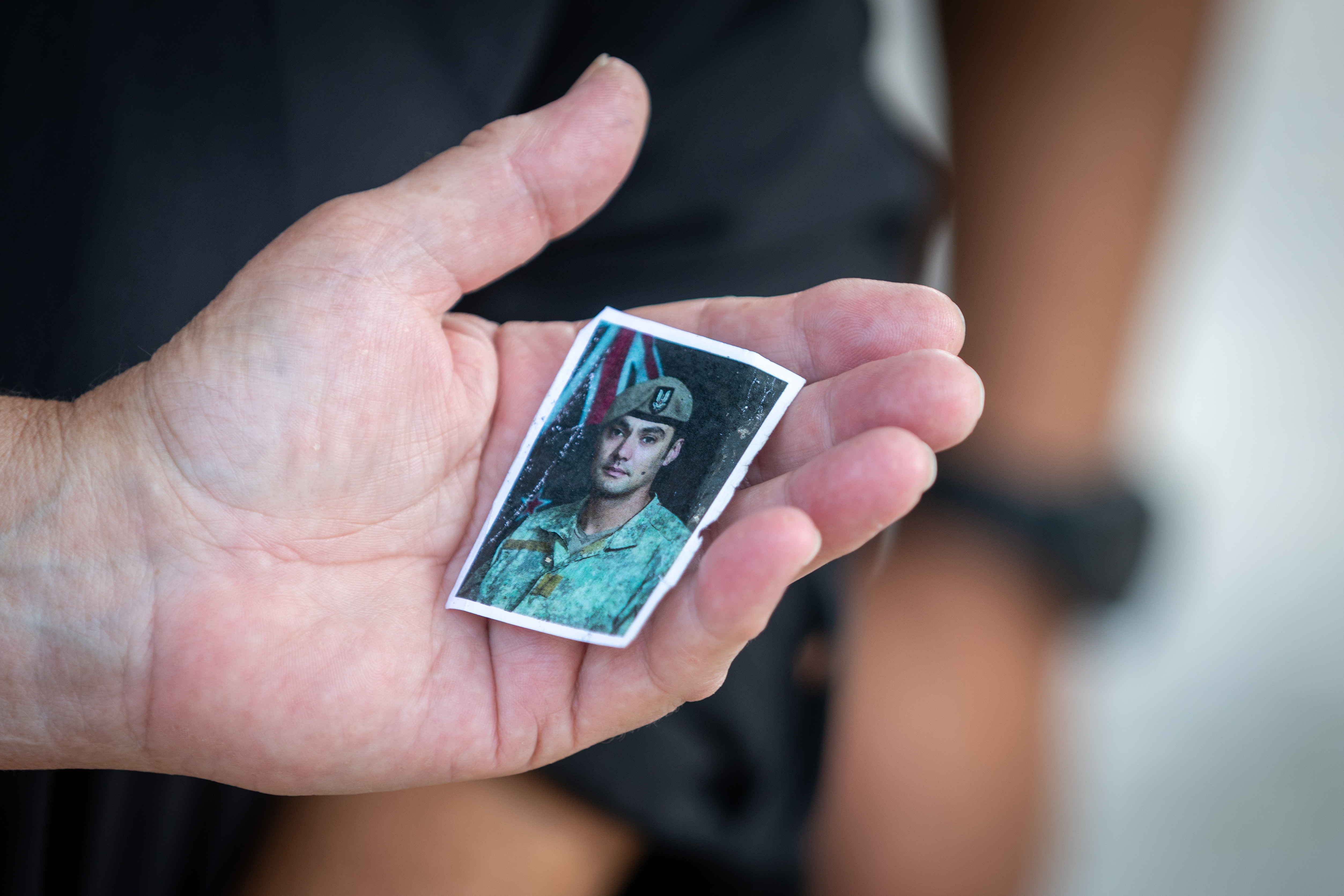 Lois Pamment holds the photograph she carries of her son, NZSAS soldier Lance Corporal Nik Kahotea.