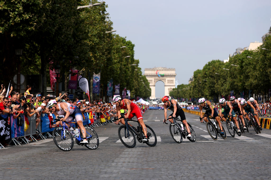 Kristian Blummenfelt of Team Norway, Tjebbe Kaindl of Team Austria and Hayden Wilde of Team New Zealand competes during Men's Individual Triathlon. Photo / Getty Images