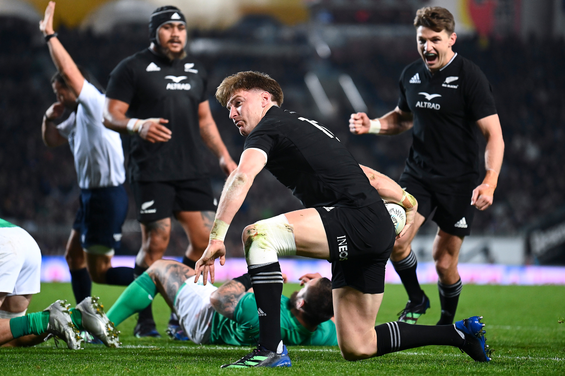 Jordie Barrett and the All Blacks celebrate their first try against Ireland. Photo / Getty