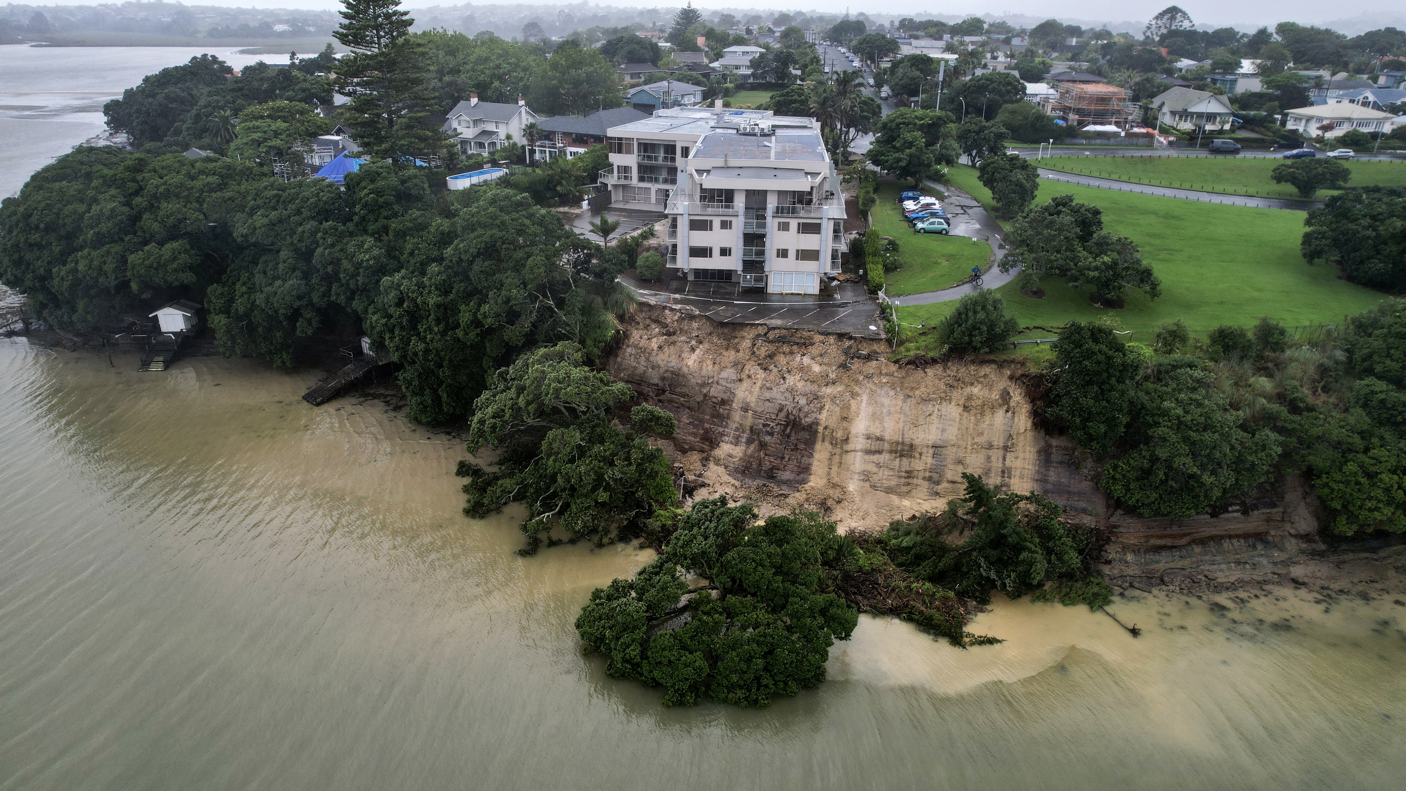 A large slip on the cliff face under the Ocean Breeze Hotel on Bayswater Ave Bayswater as heavy rain hits Auckland causing widespread flooding
New Zealand Herald photograph by Brett Phibbs 01 February 2023