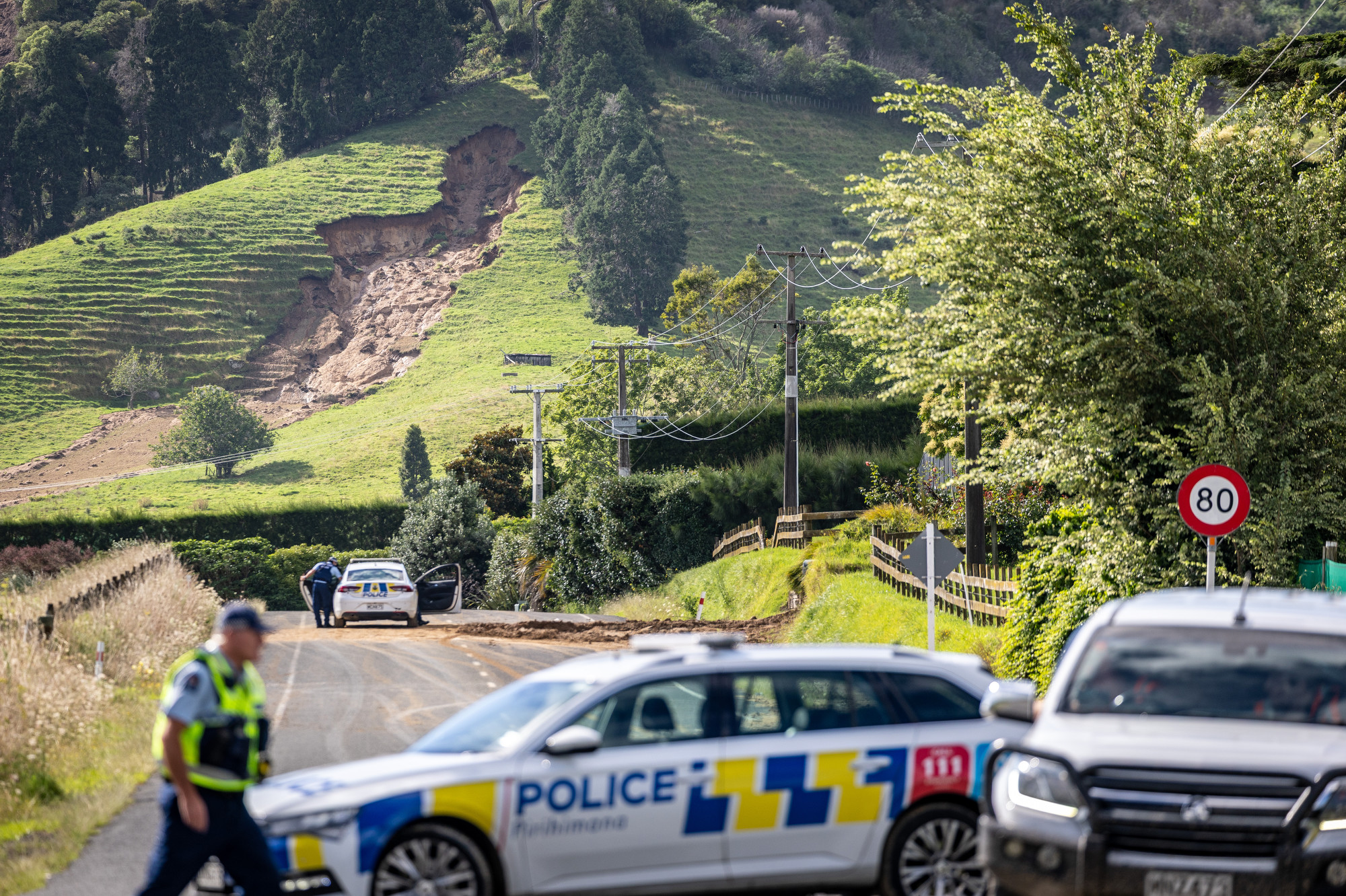 Two people were killed in the landslip on Welcome Bay Rd, Pāpāmoa. Photo / Michael Craig
