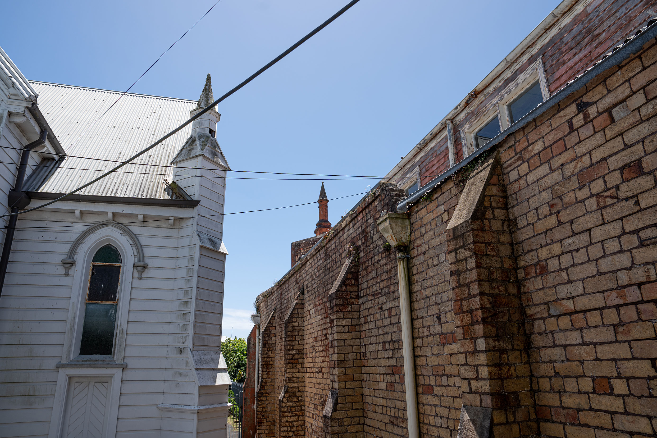 The white Knox Church in Parnell is protected under the Auckland District Plan but the red brick church hall is not. Photo / Cameron Pitney
