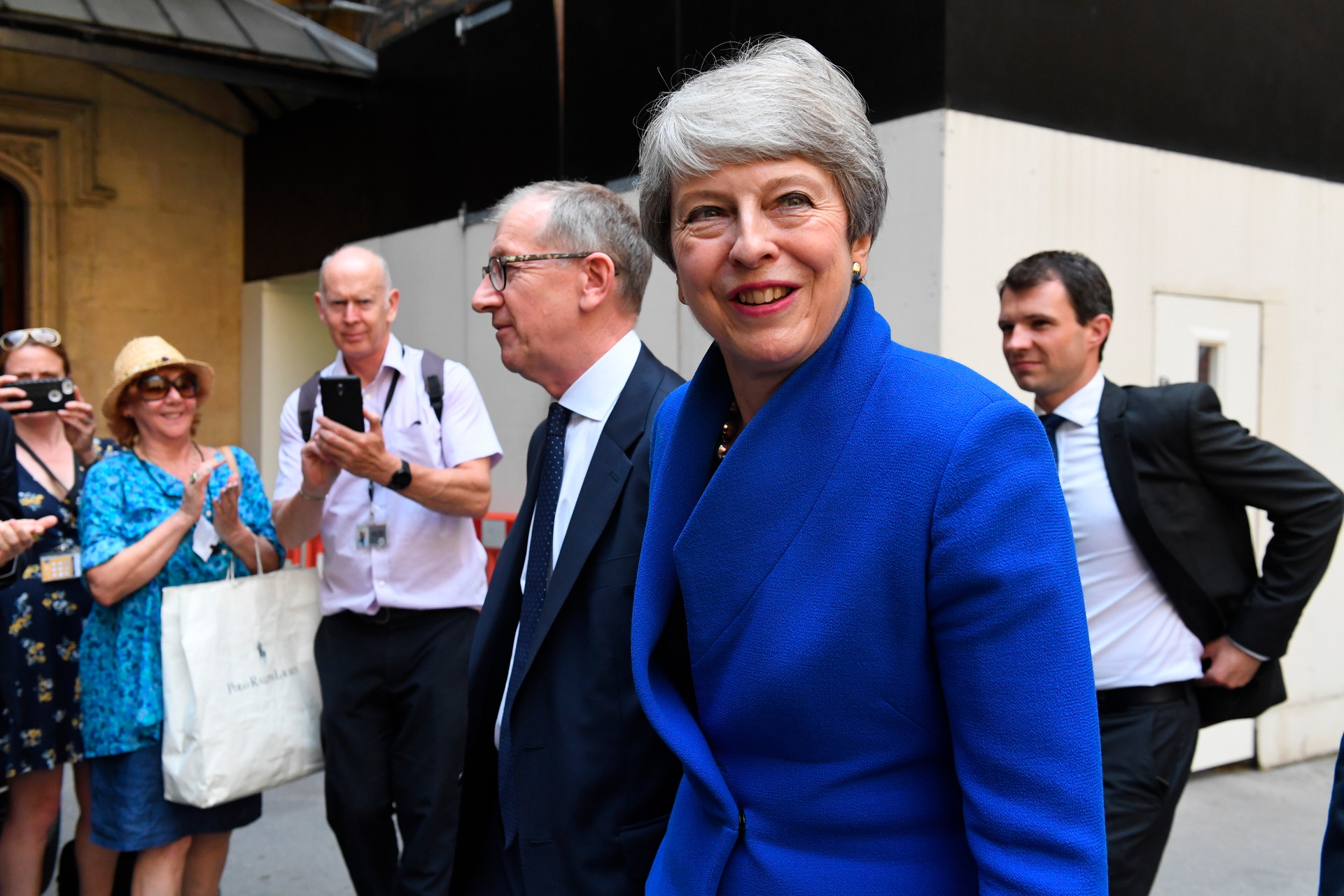 Former Prime Minister Theresa May said she hopes young girls who have seen her in high office will believe