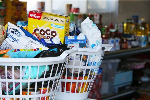 The carefully assorted Christmas kai boxes will be a welcome relief to families in Whangārei. Photo / Tania Whyte