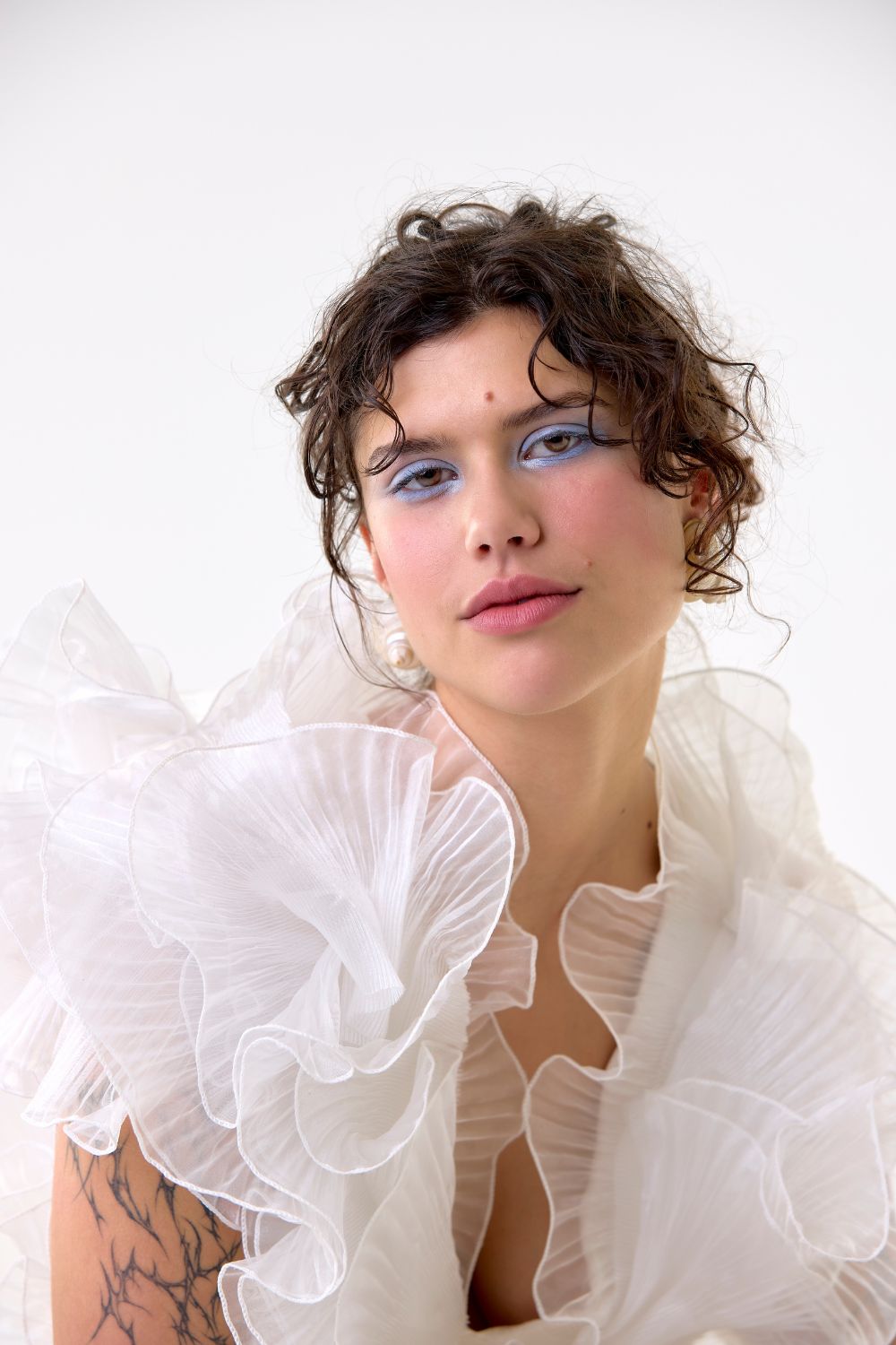 Brooke Tyson Ritual dress $3400. Ceremony by Mia Straka earrings $490. Photo / Babiche Martens