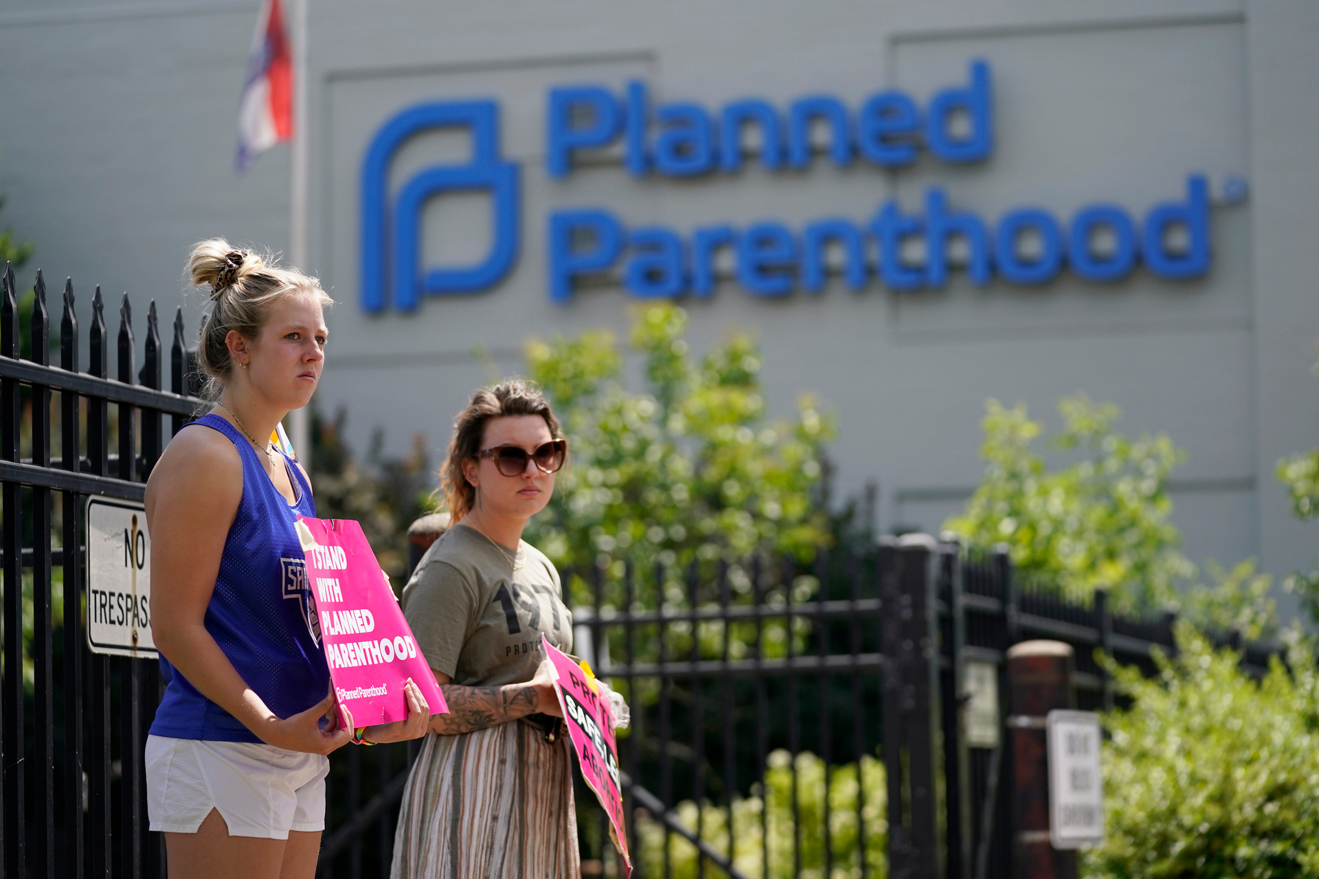 Abortion-rights protesters stand outside a Planned Parenthood centre. Photo / AP