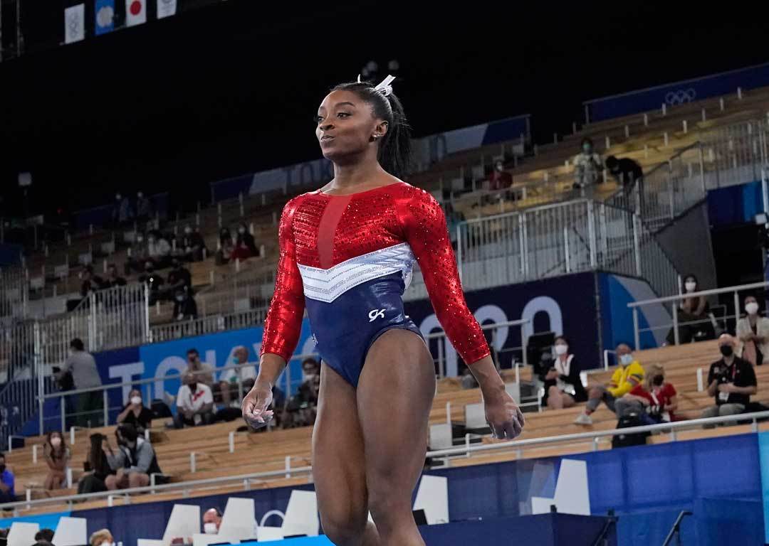 Simone Biles, of the United States, walks after performing on the vault during the artistic gymnastics women's final at the 2020 Tokyo Olympics. Photo / AP