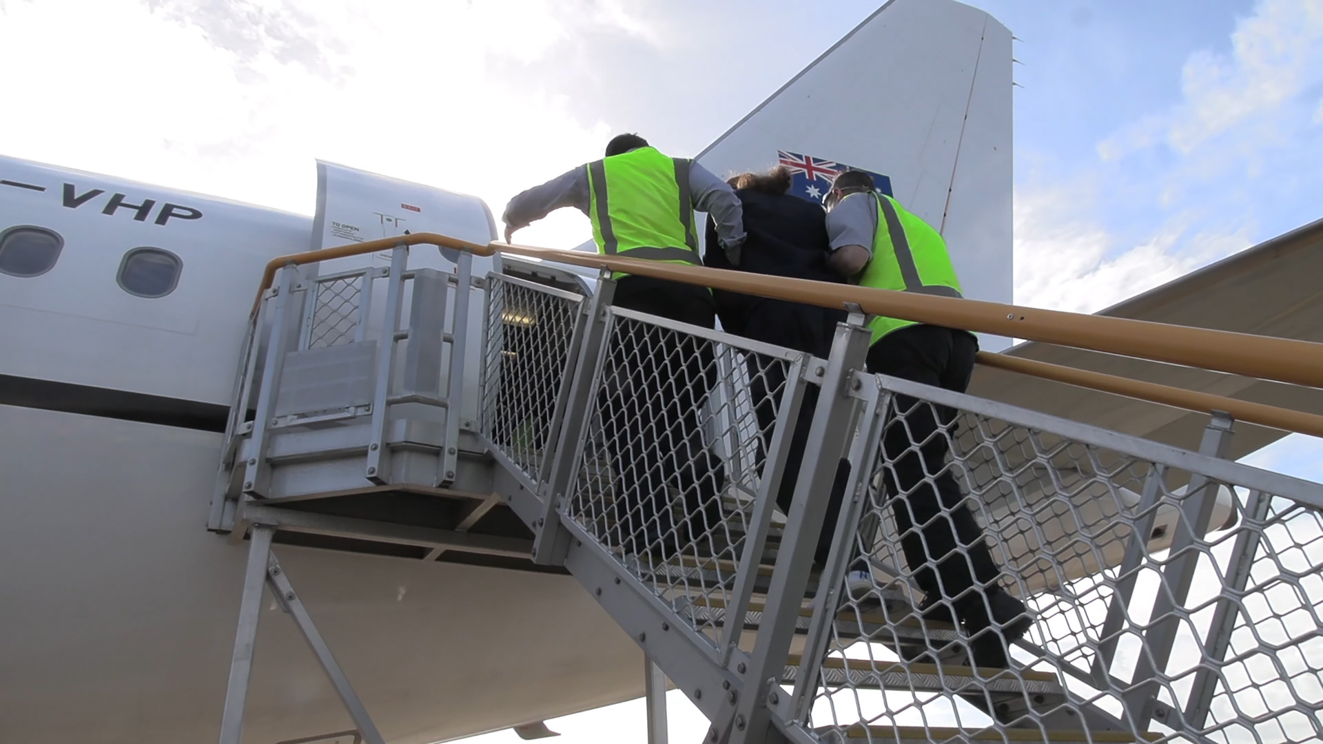 A deportee put a repatriation flight from Sydney to New Zealand in video shot by the Australia Department of Home Affairs. Photo / Supplied