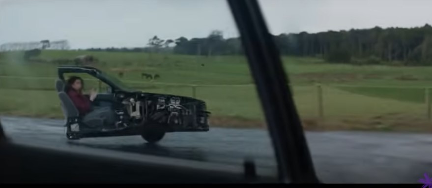A scene from Spark's split-car advertisement.