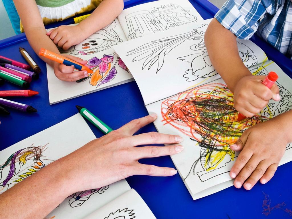 The teacher was observed drinking from a Gatorade bottle throughout the afternoon, including when she was supervising children playing outside.
