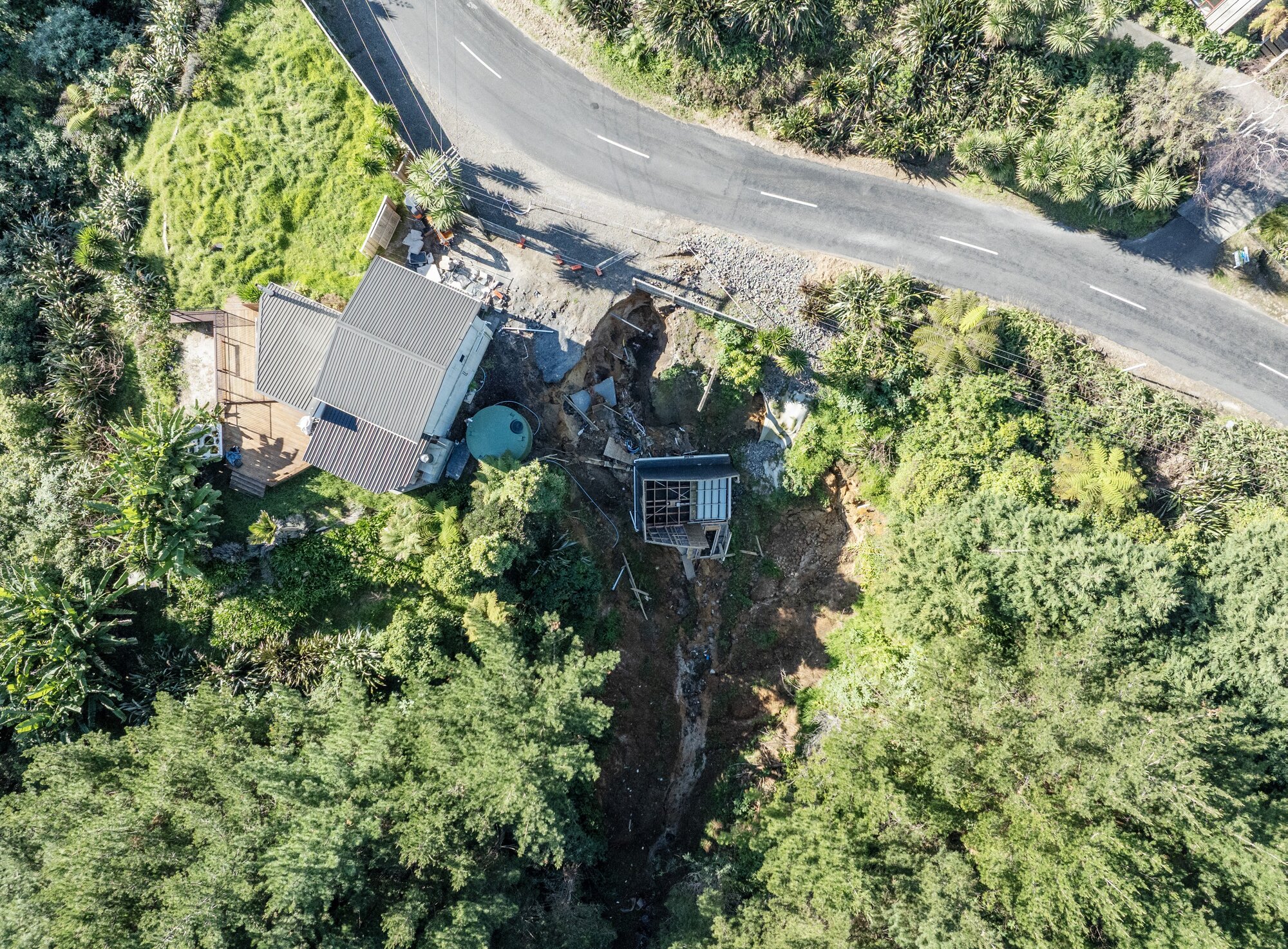Matt and Sian du Plessis' Reid Rd home in Pāpāmoa sits precariously close to an ever-growing landslip triggered on January 22 this year. Photo / Mike Scott