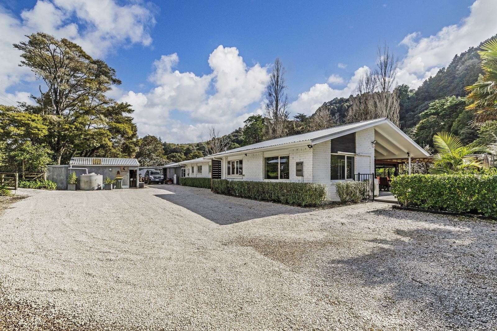  508 Weranui Rd, Wainui in Auckland suffered the biggest fall in the new council valuations, from $2.15m to $50k, due to it being a Category 3 storm-damaged home on a floodplain.