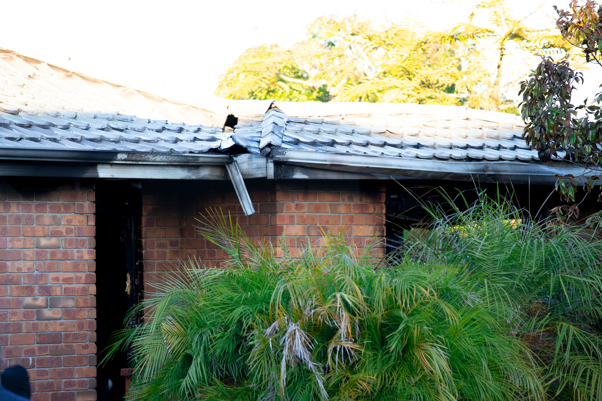 Fire damage to a home in Hercules Drive, Henderson. The fire is being treated as suspicious by police. Photo / Hayden Woodward