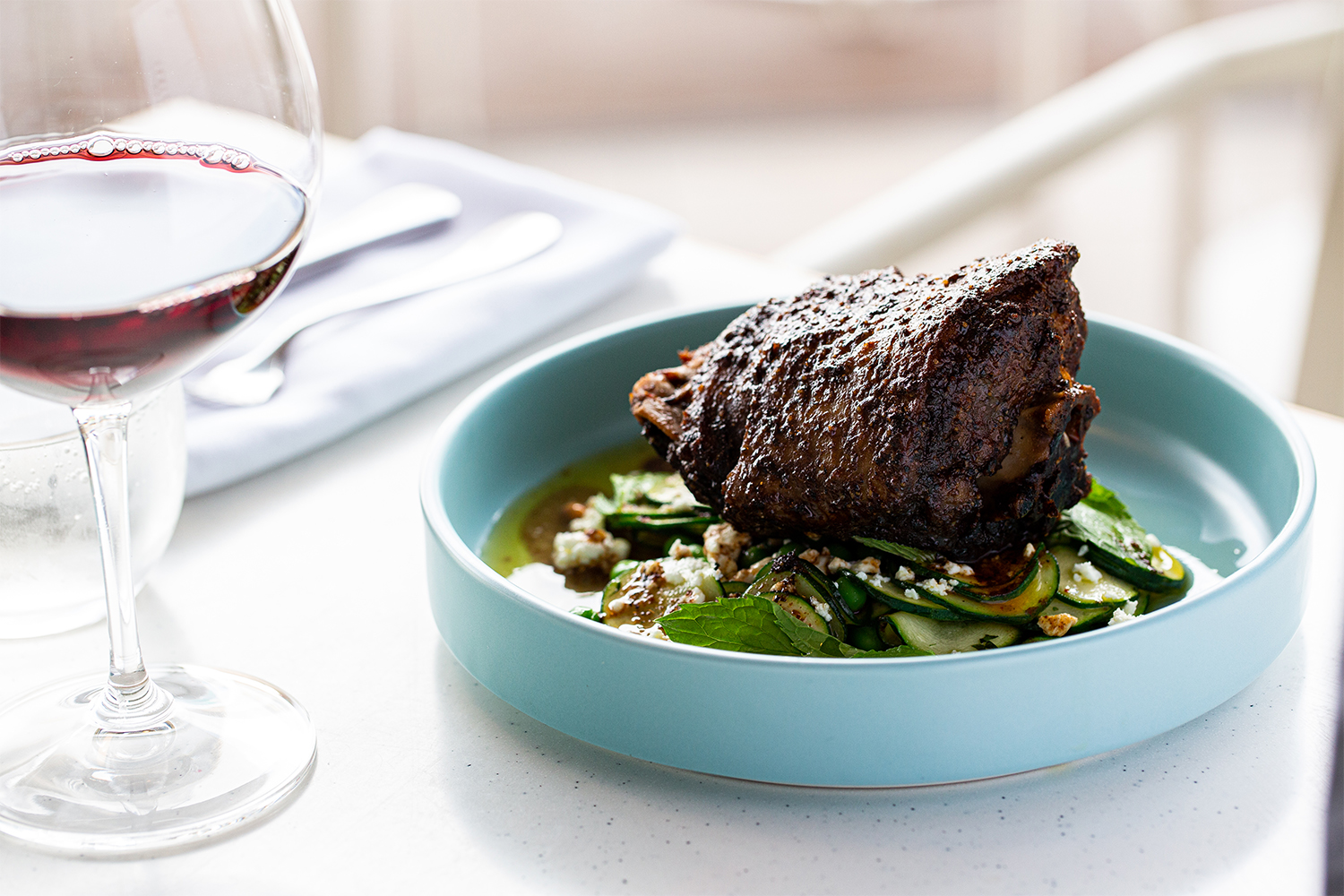 Euro's lamb neck with zucchini, cucumber, mint, pine nuts and  feta. Photo / Babiche Martens