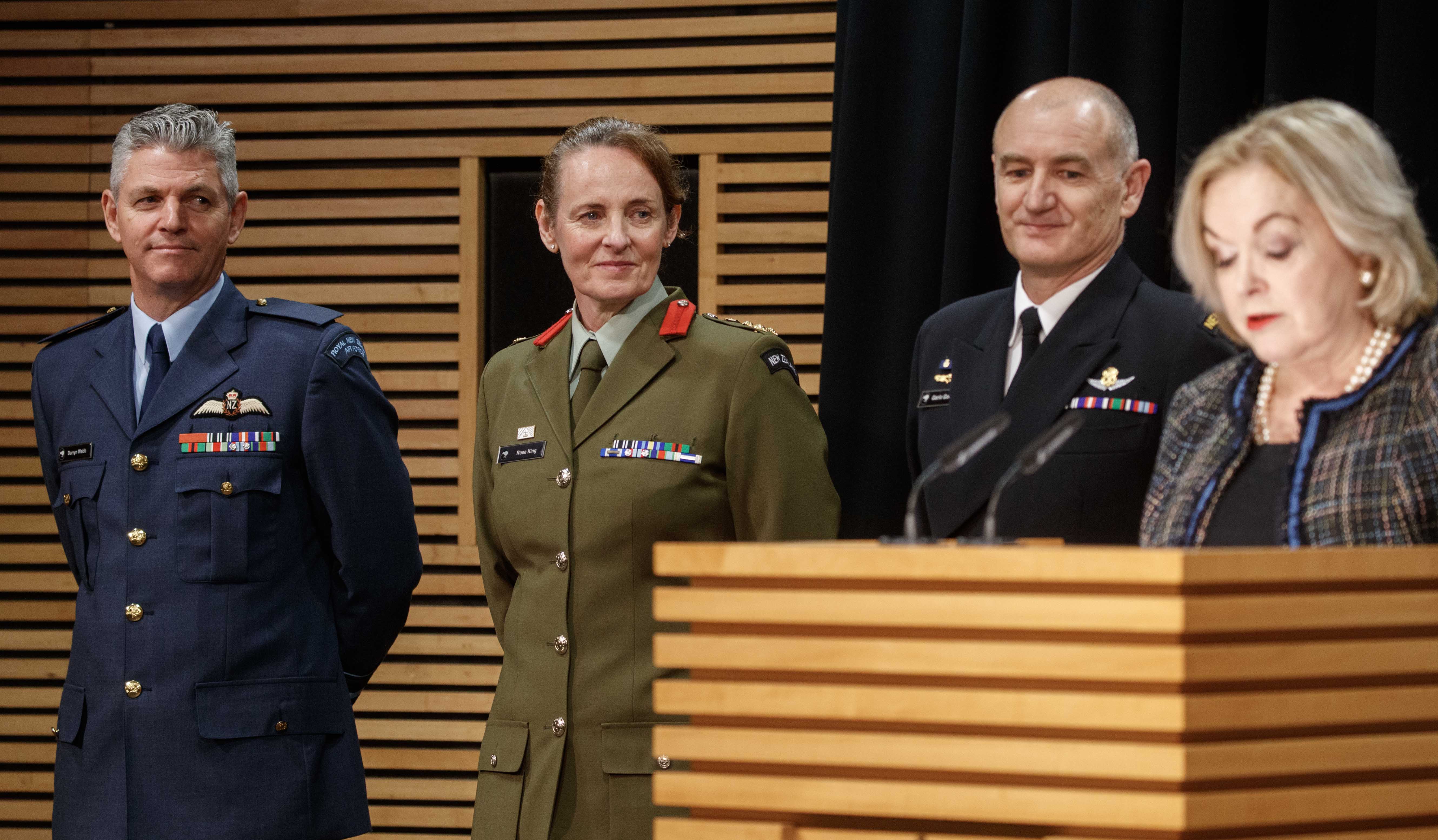 Defence Minister Judith Collins today announcing Commodore Garin Golding, right, Brigadier Rose King, centre, and Air Vice-Marshal Darryn Webb, left, as the chiefs of the Navy, Army and Air Force respectively. Photo / Mark Mitchell.