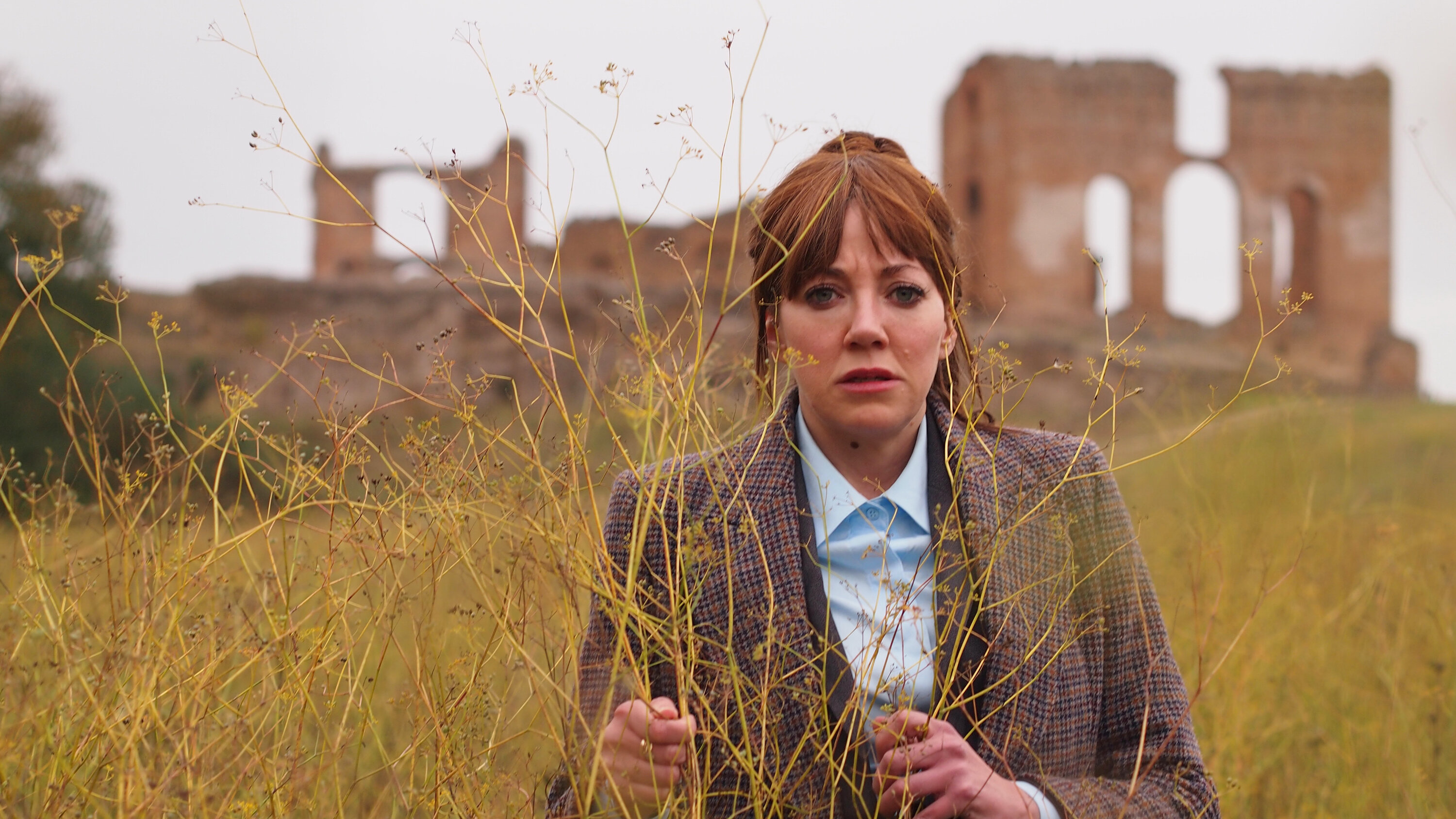 Philomena Cunk (Diane Morgan) asks questions like, “Was the invention of writing a significant development or more of a flash in the pan?” Photo / Jonathan Browning, Netflix