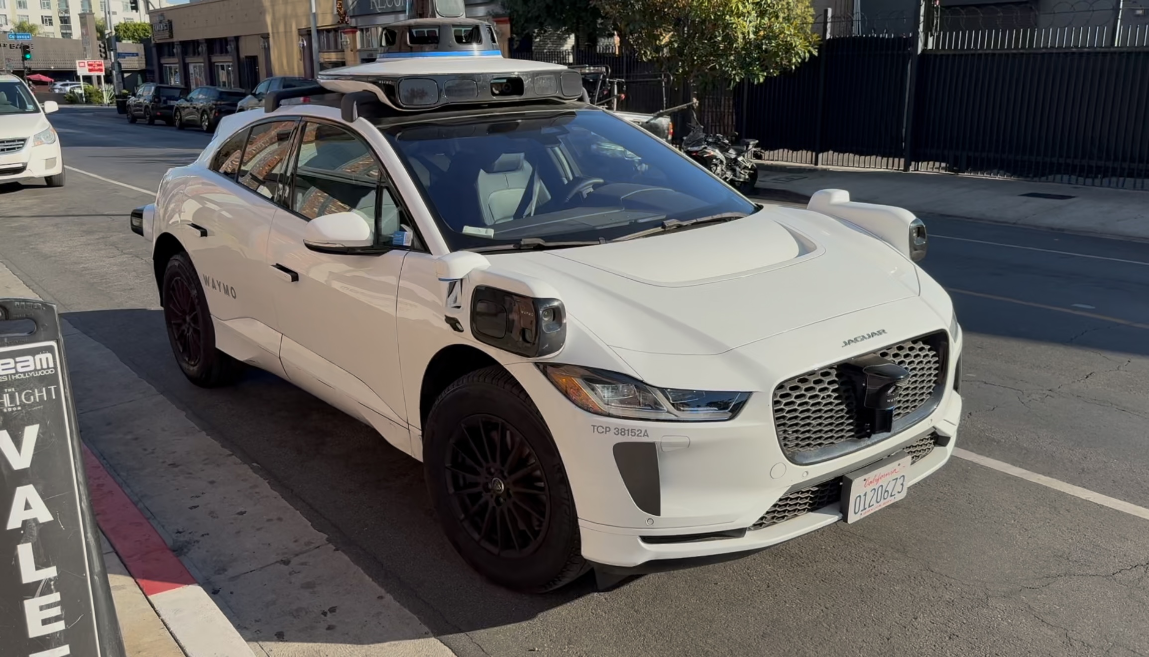 My Waymo after dropping me off at my hotel. It's parked quite a gap away from the kerb and on a red line - the California equivalent to our double yellow - but it was the Valet drop-off zone, where vehicles frequently stop. Photo / Chris Keall