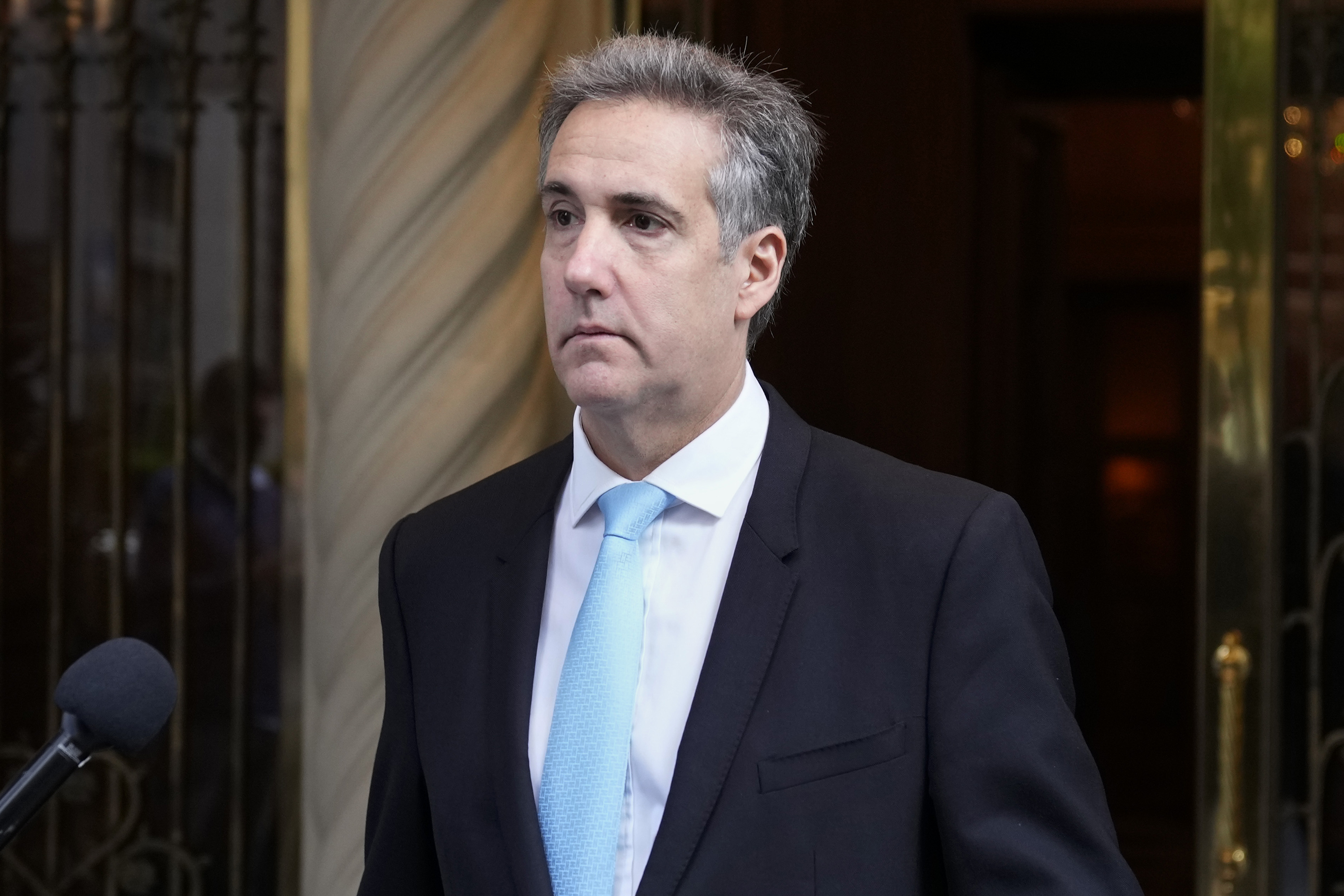 Michael Cohen leaves his apartment building on his way to Manhattan criminal court in New York on May 14. Photo / AP