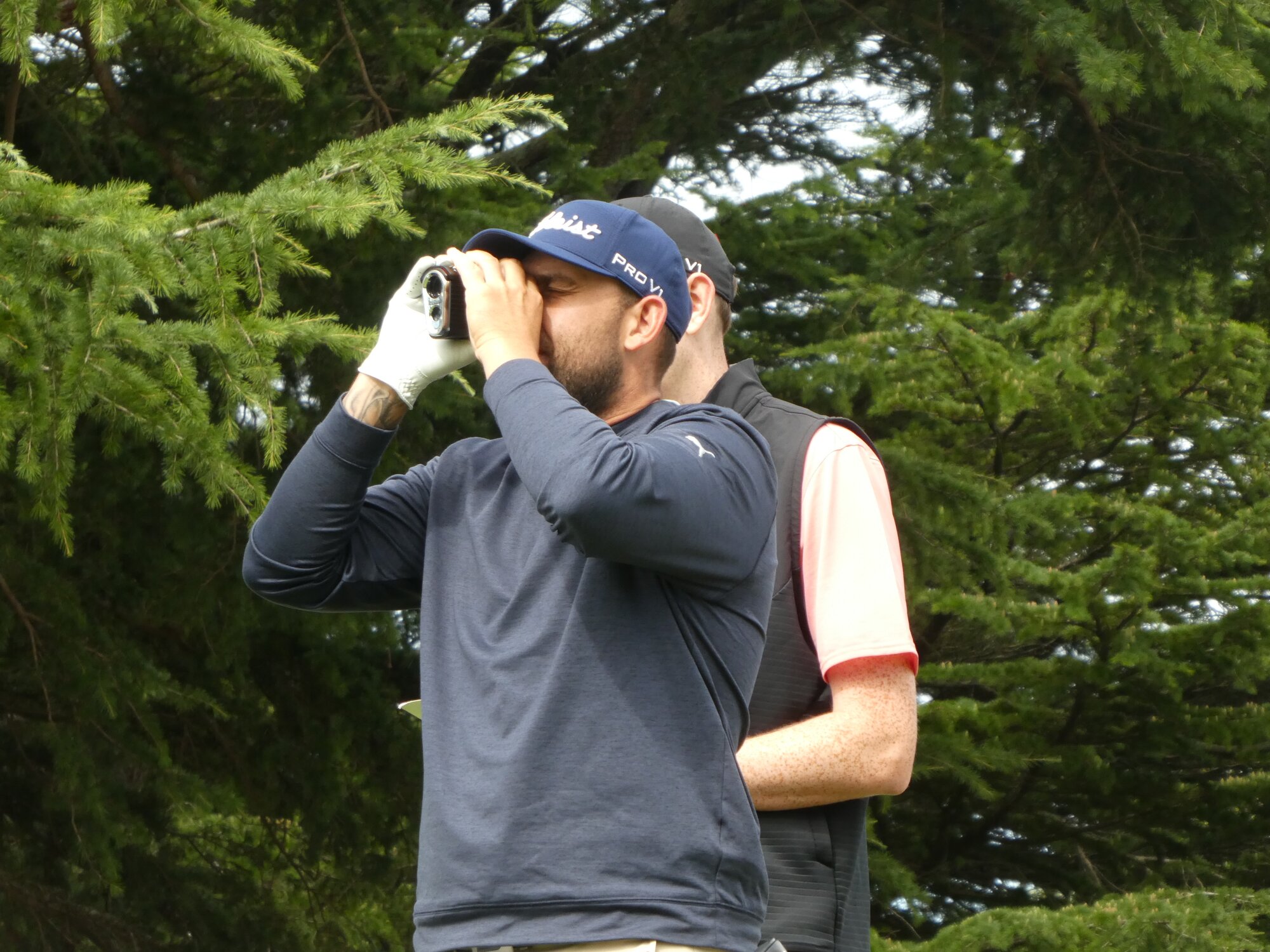 Ryan Peake checks out the lie of the land before teeing off at Hastings Golf Club. Photo / Neil Reid