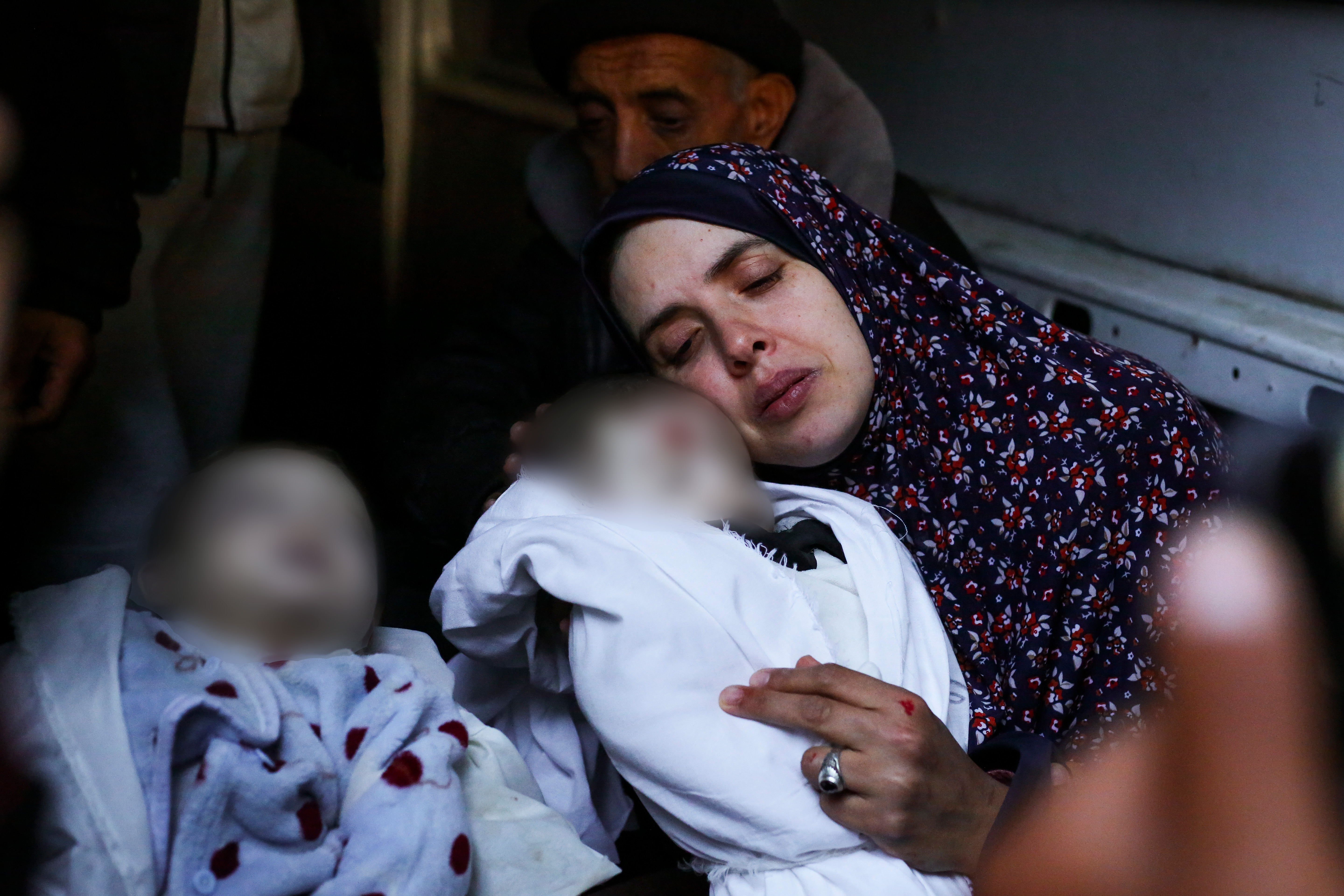 Rania Abu Anza cradles her twins, who were killed in an Israel strike on a house in Rafah, in the southern Gaza Strip, Sunday, March 3, 2024. Photo / AP