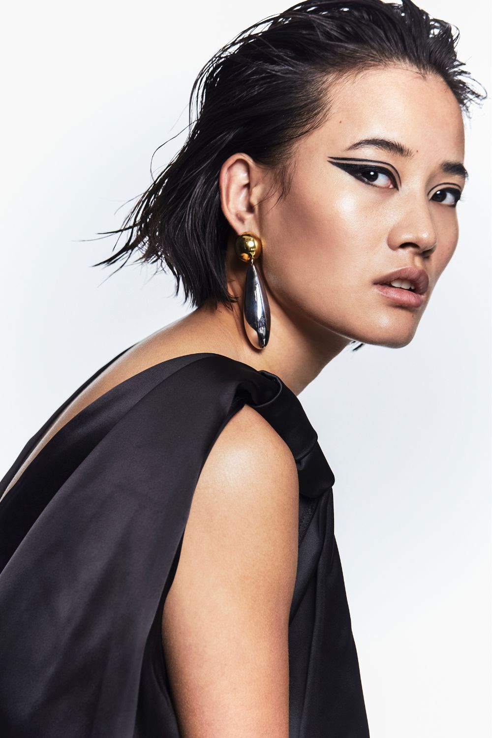 Lin wears Harris Tapper dress and Jasmin Sparrow earrings. Photo / Carolyn Haslett