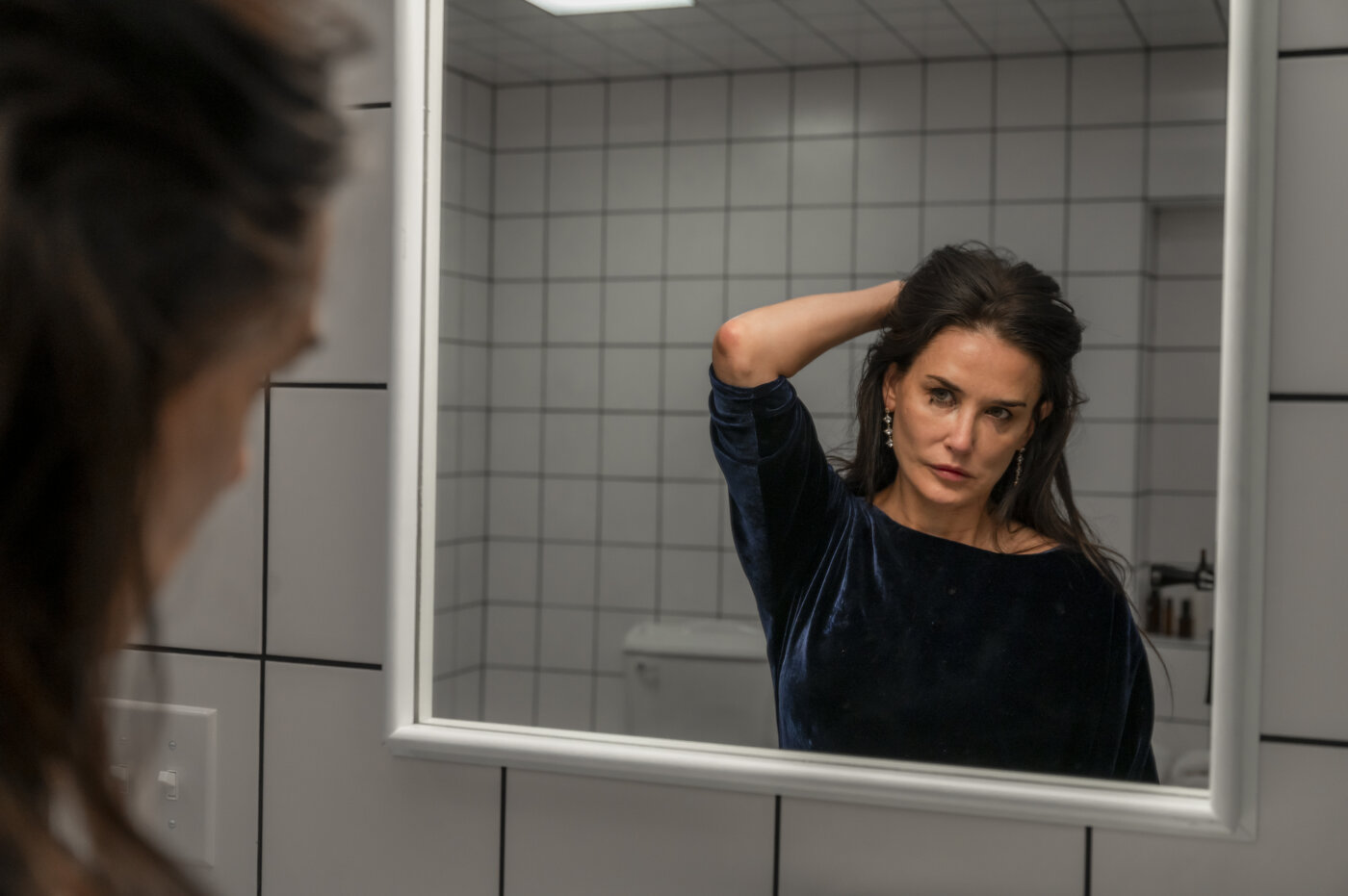 Demi Moore as an actress coping with issues of ageing in Hollywood in The Substance.
