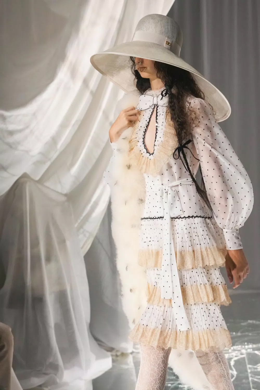 Big hats, lots of layering and more novel ideas from Valentino's Alessandro Michele.