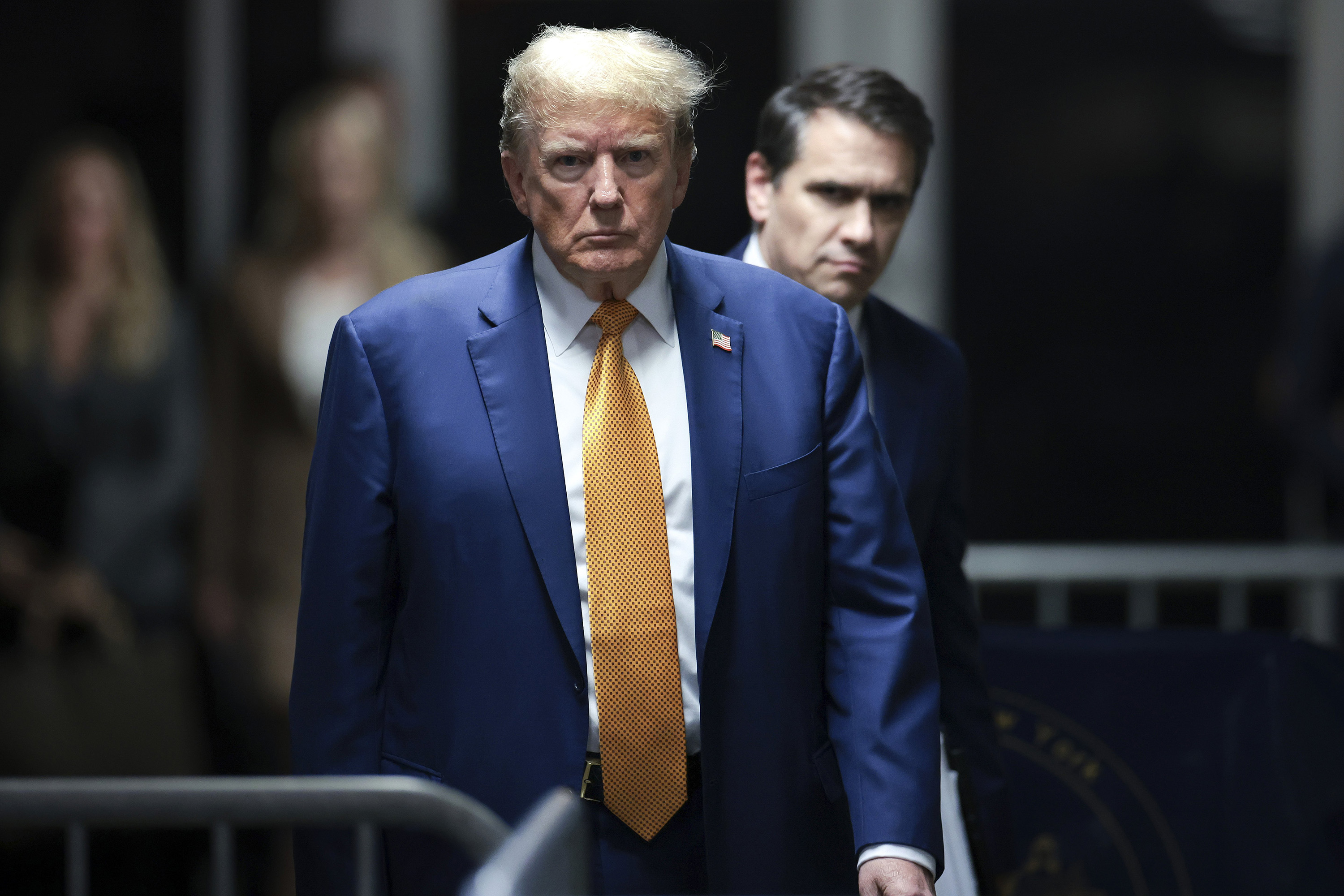 Former President Donald Trump, followed by his attorney Todd Blanche, walks to speak to reporters following the day's proceedings in his trial, Tuesday, May 7, 2024, in New York. Photo / AP